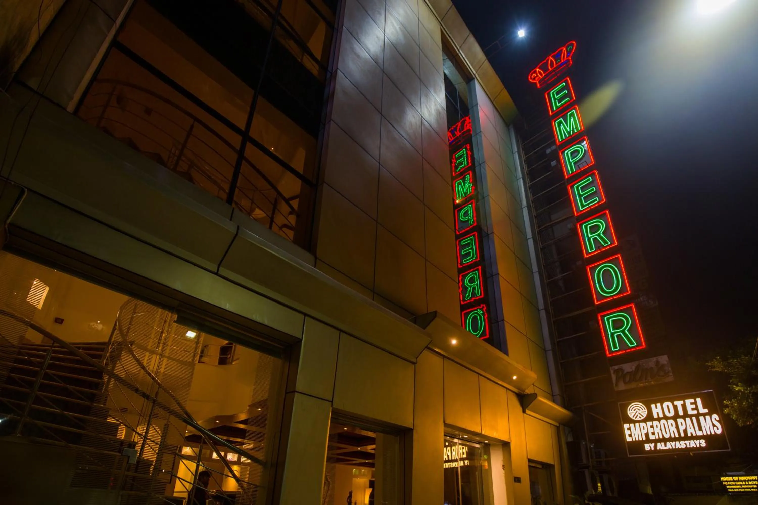 Property building in Alaya Stays Hotel Emperor Palms