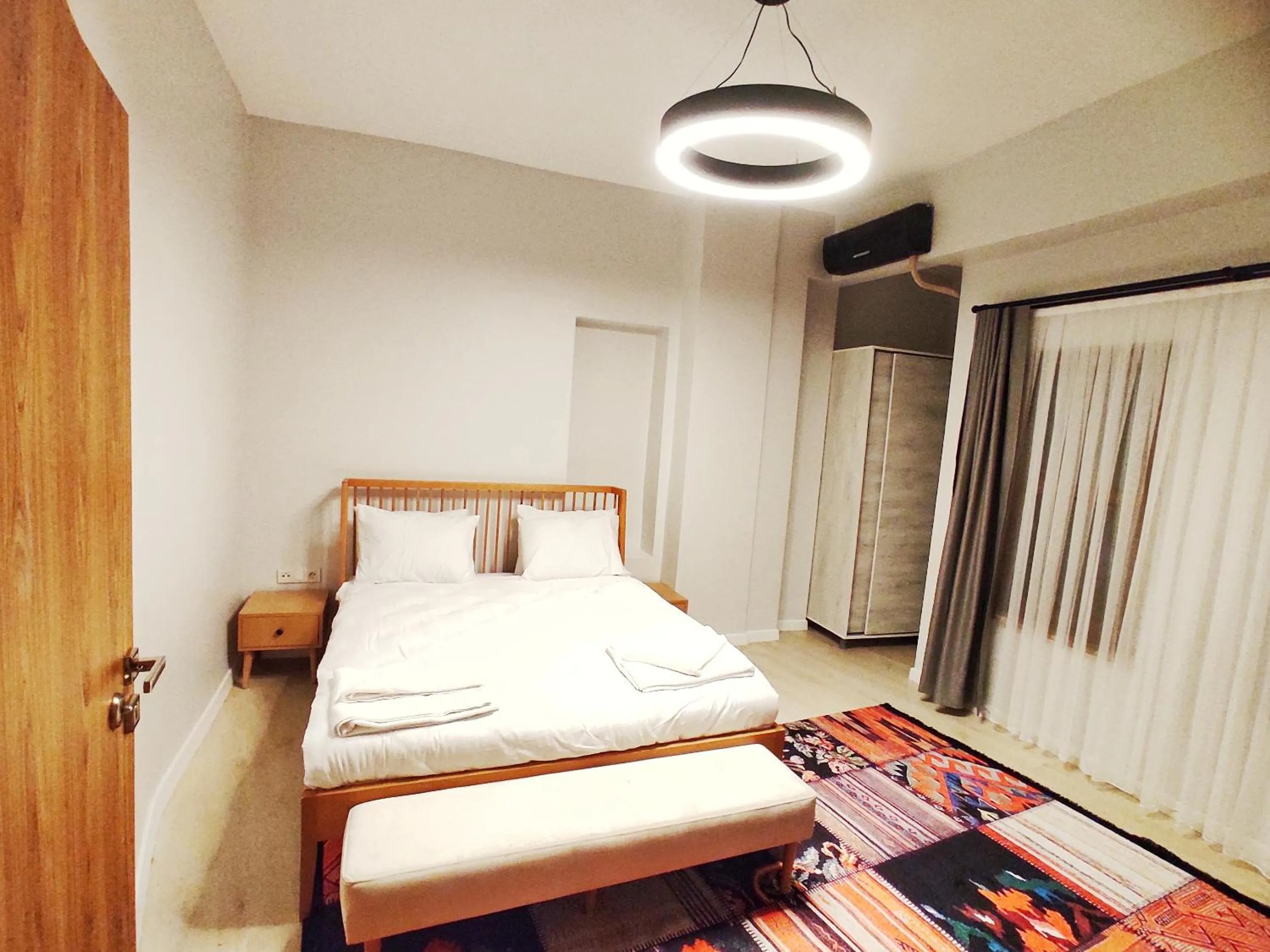 towels, Bed in Million Old City Apartment