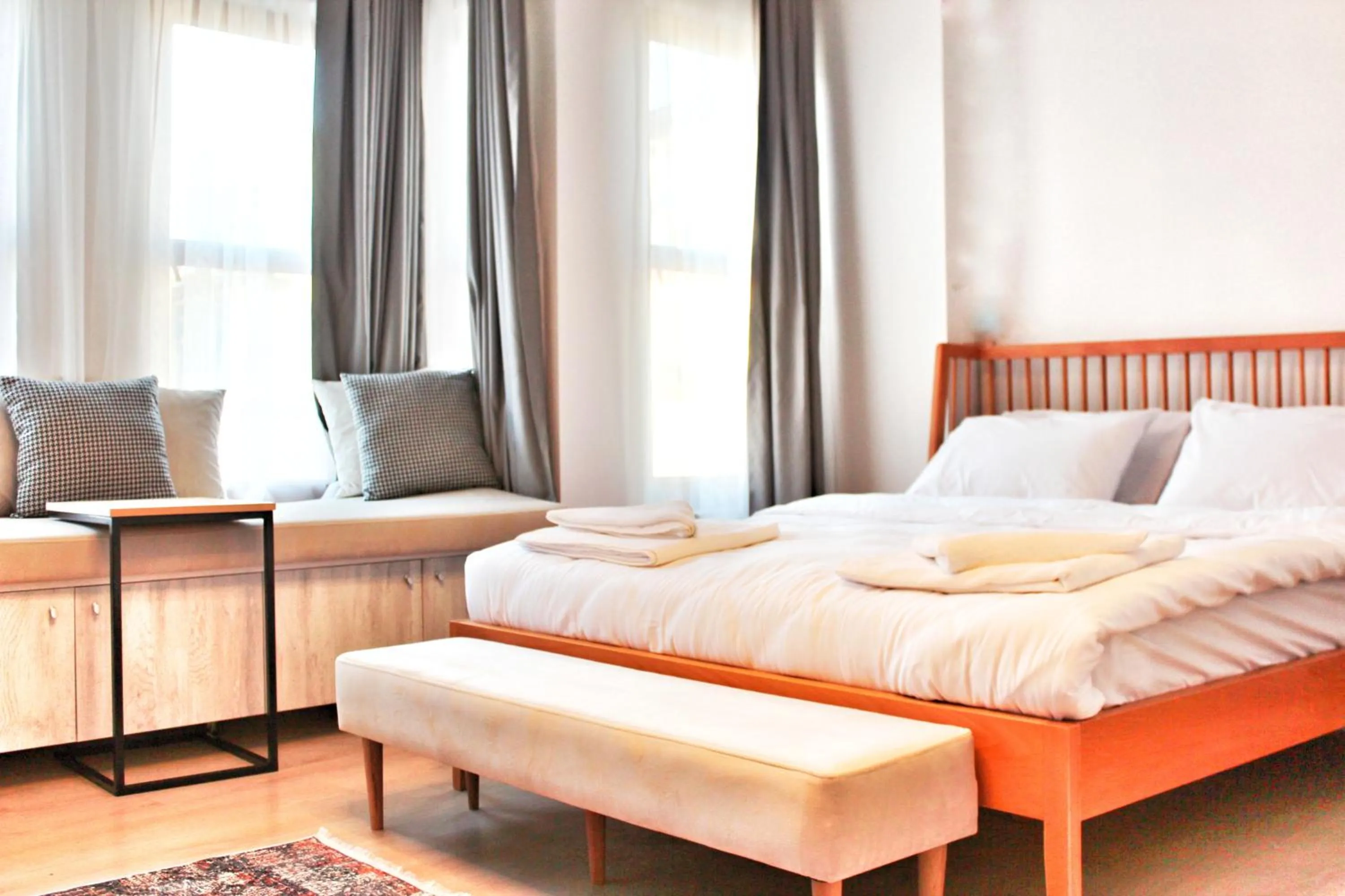 towels, Bed in Million Old City Apartment