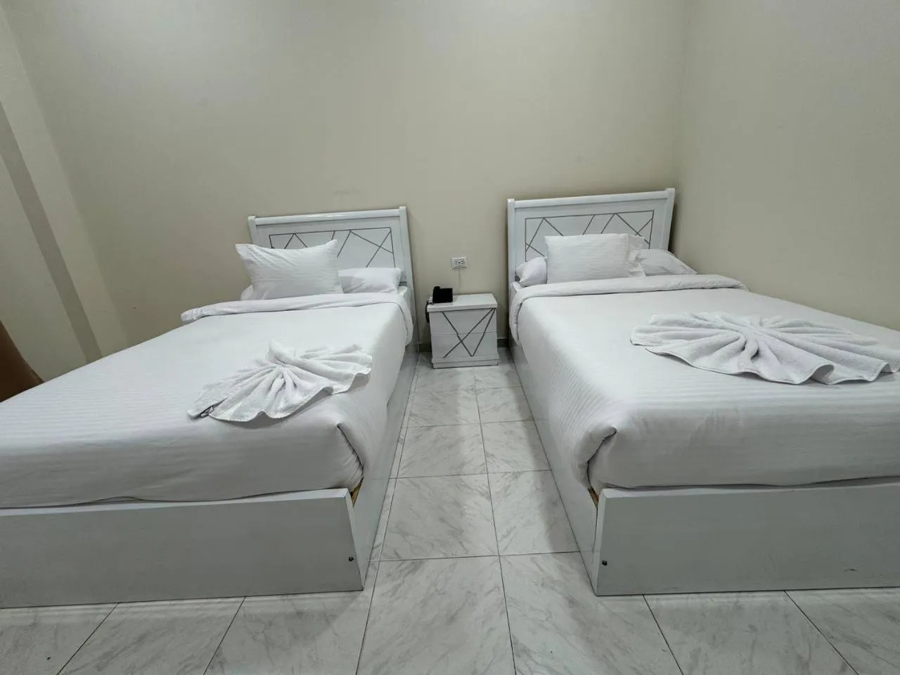 Bed in Cairo Crown Hotel