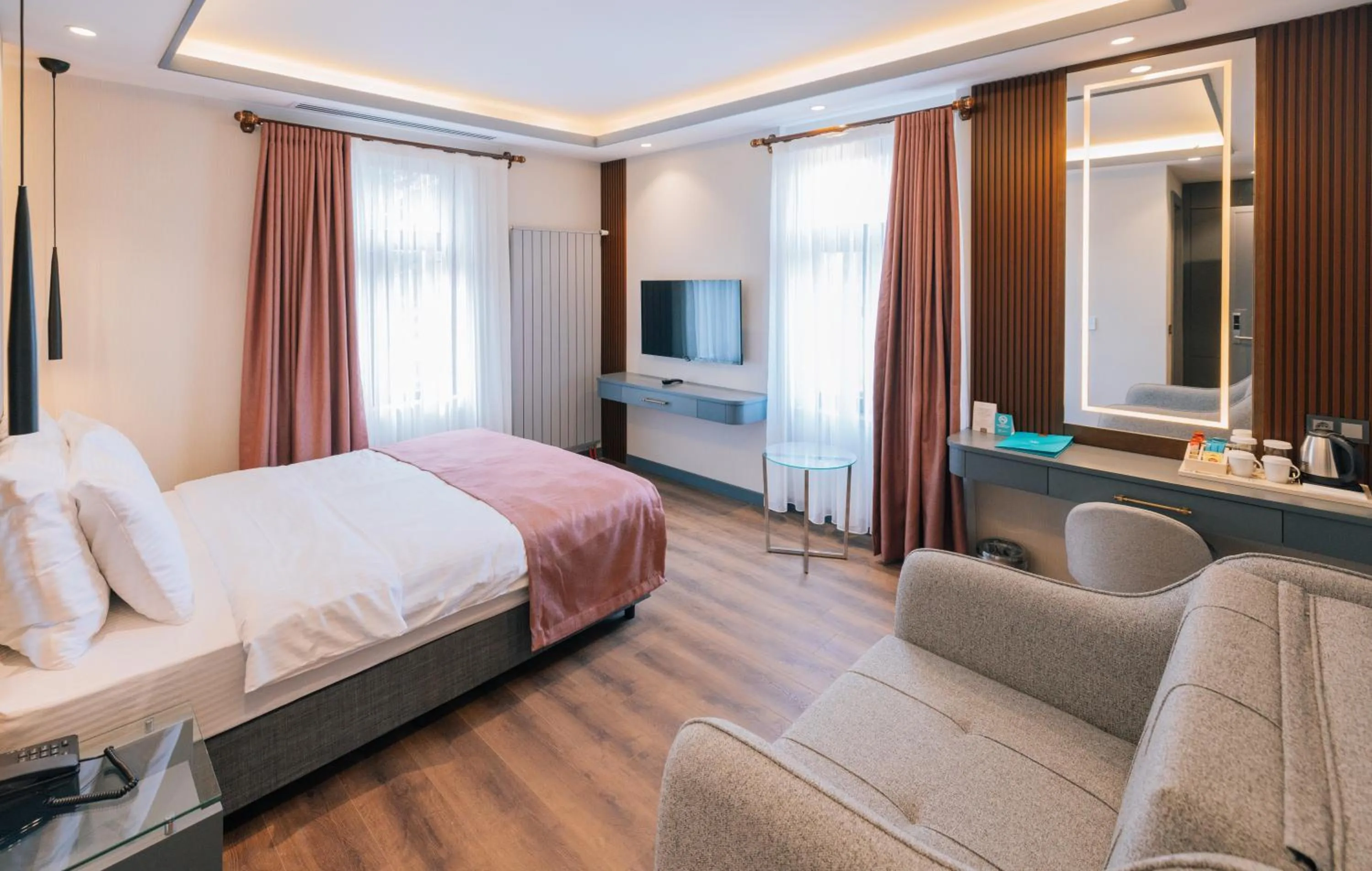 Bed in VE Hotels Adakale