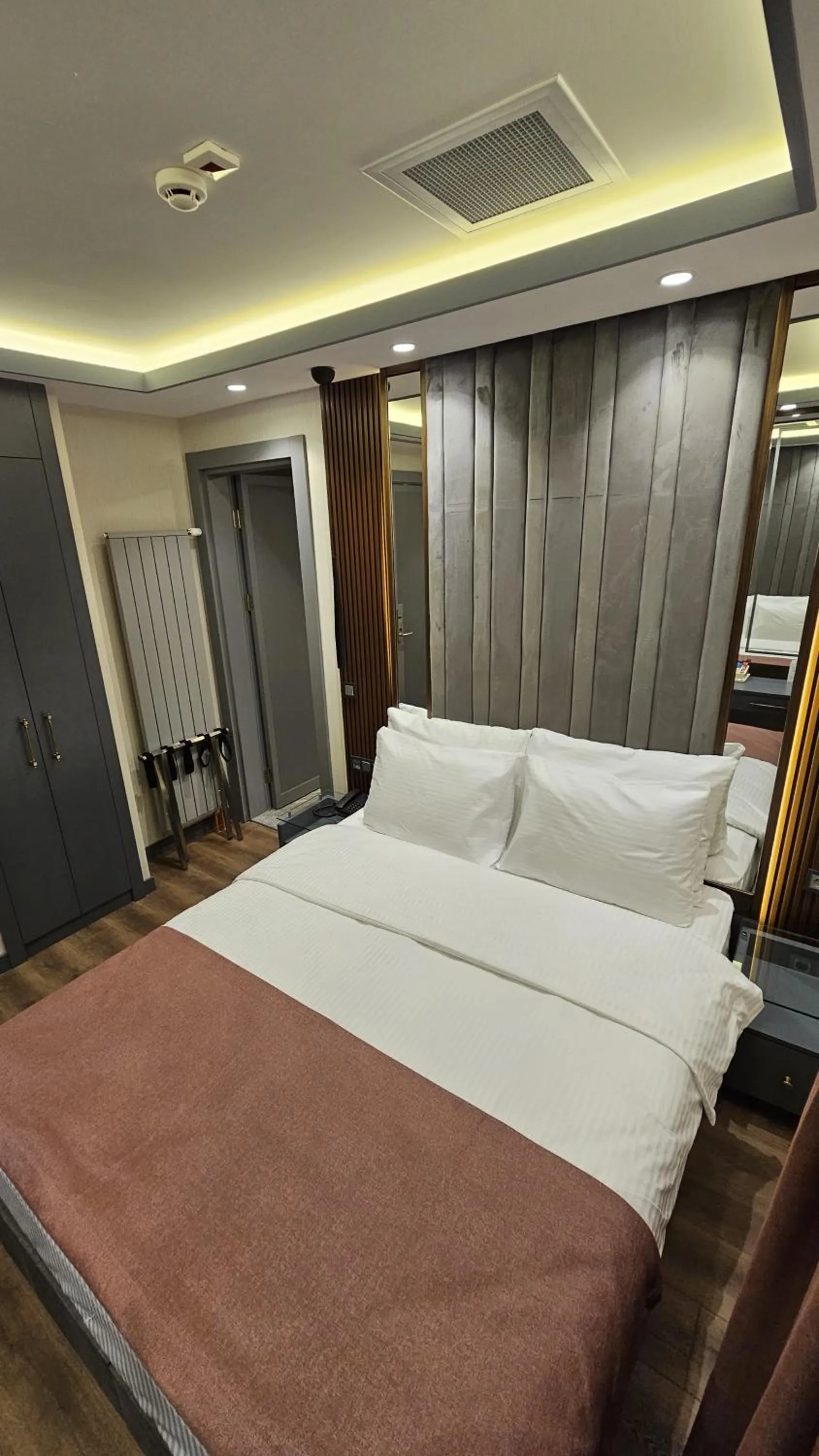 Bed in VE Hotels Adakale