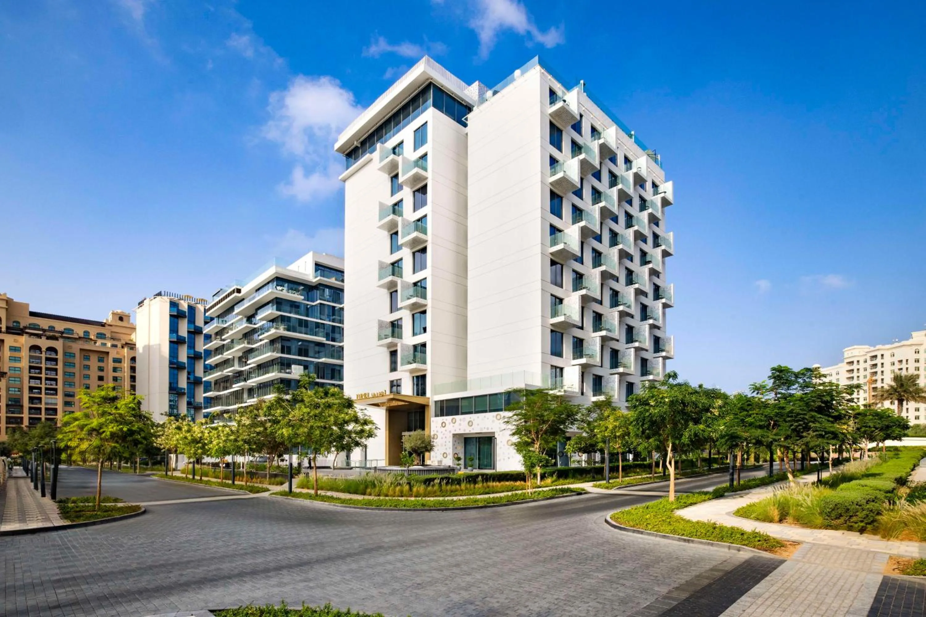 Property building in Tumbi Hotel Dubai The Palm,Tapestry Collection Hilton