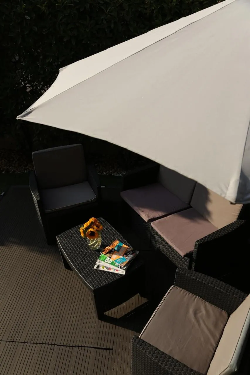 Garden in B&B Villa Milano by Rhospitality it