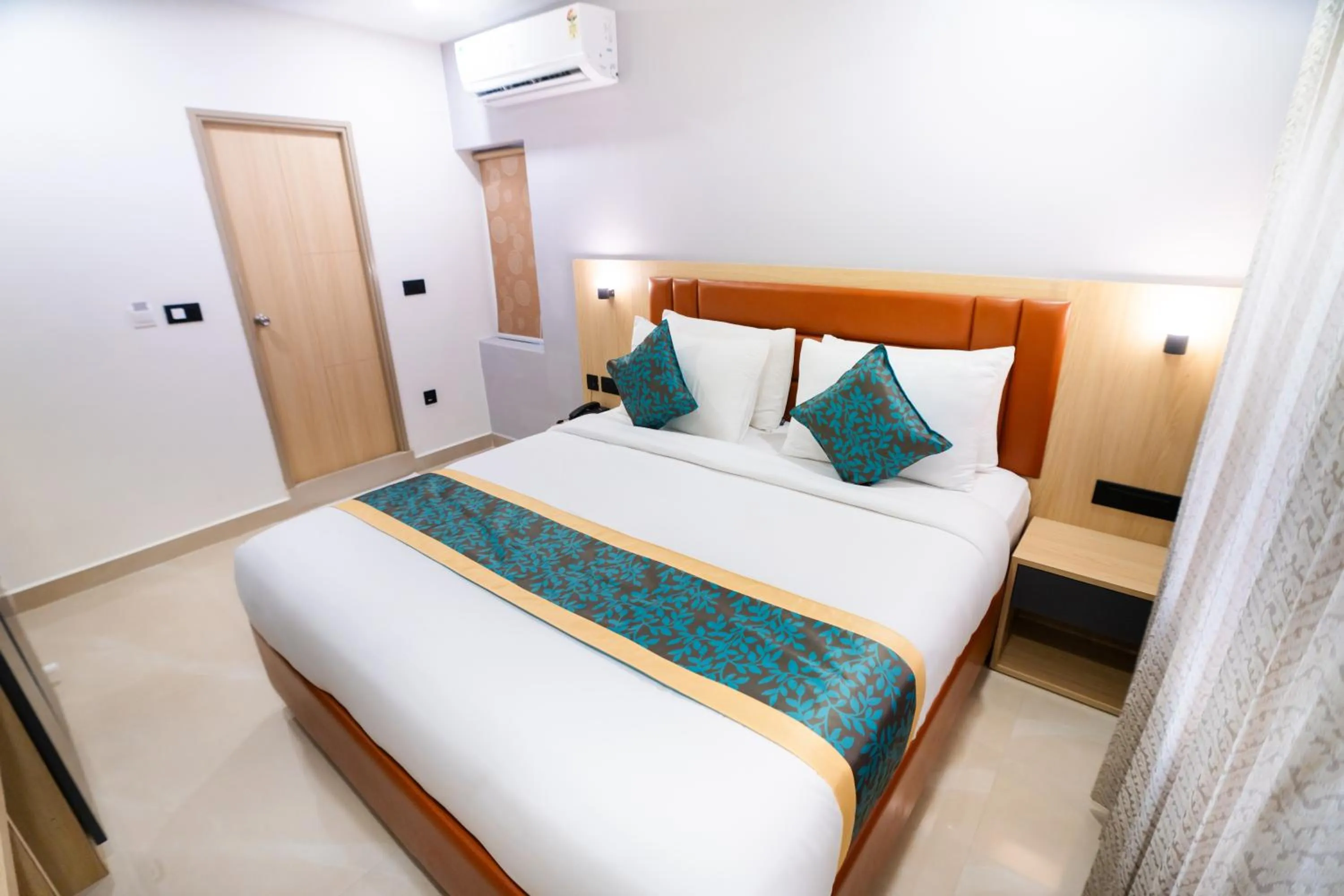 Bedroom, Bed in Sunrise Business Hotel, S R Nagar - Ameerpet