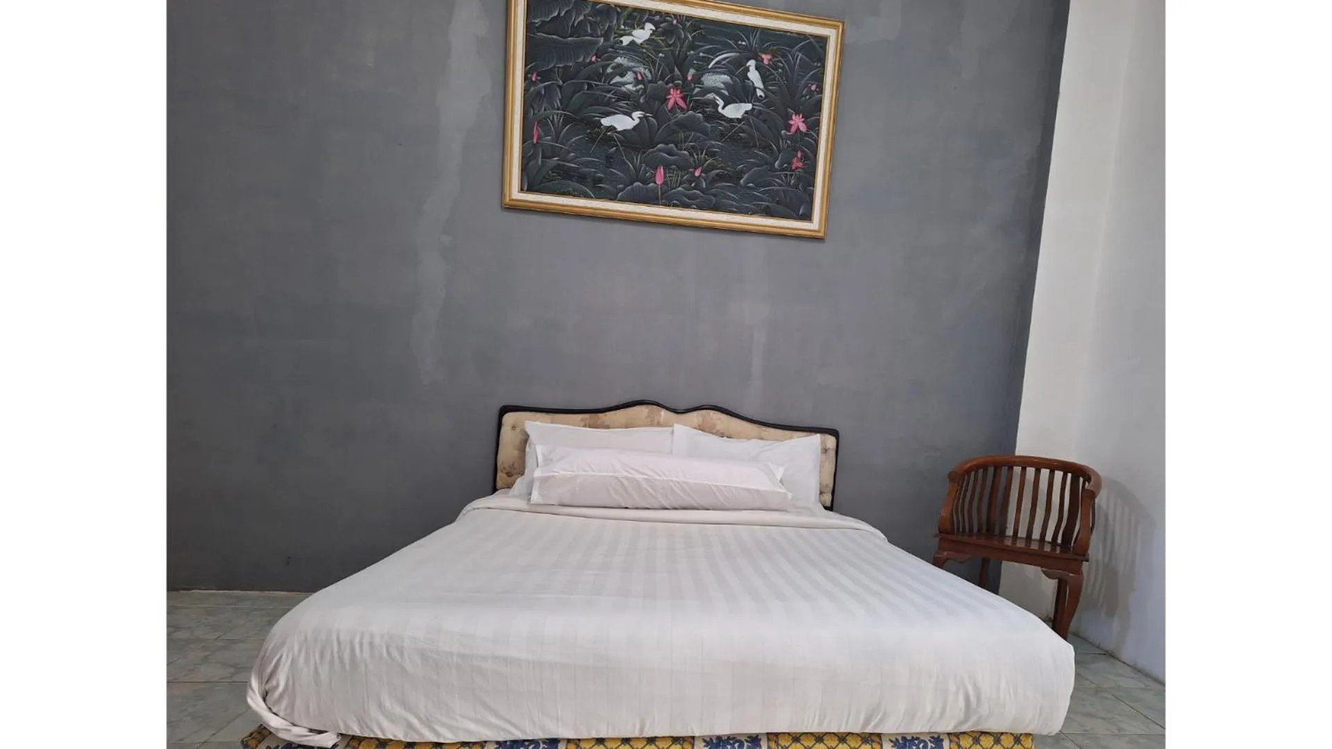Bed in PLUM Hotel Palereman Batu