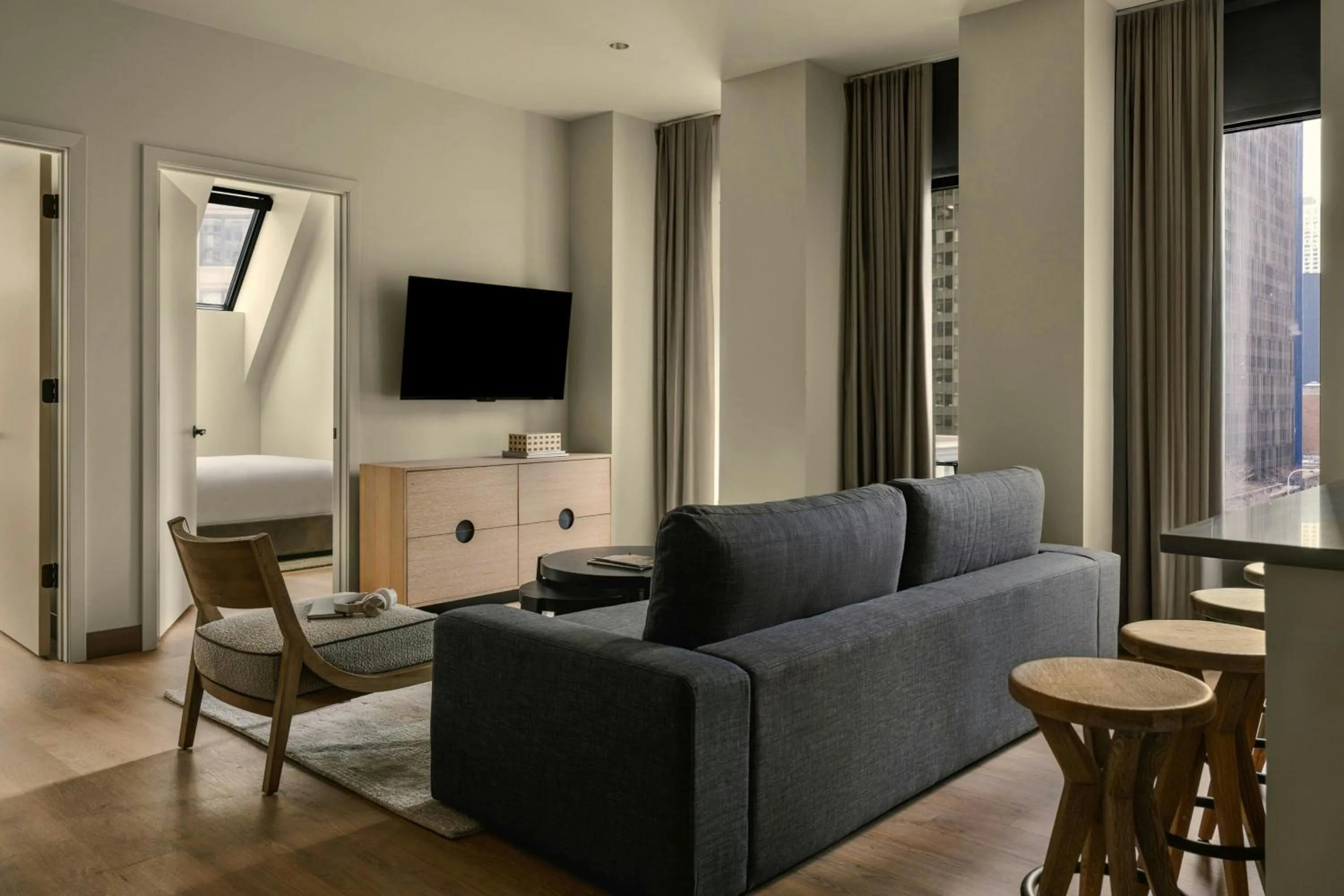 Living room, Bed in Sonder by Marriott Bonvoy Onterie Apartments Magnificent Mile