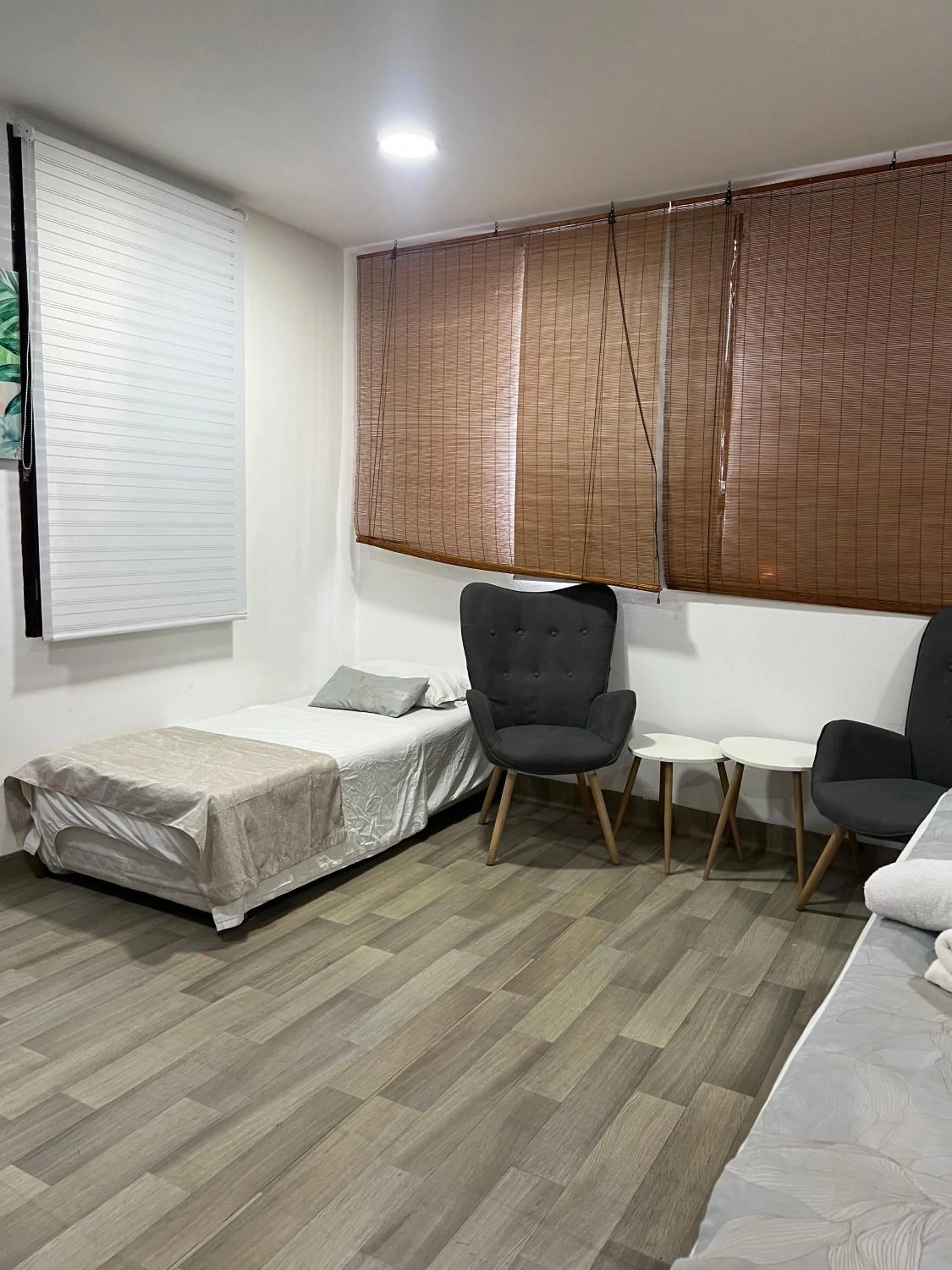 Seating area, Bed in Santa Alejandría Hotel