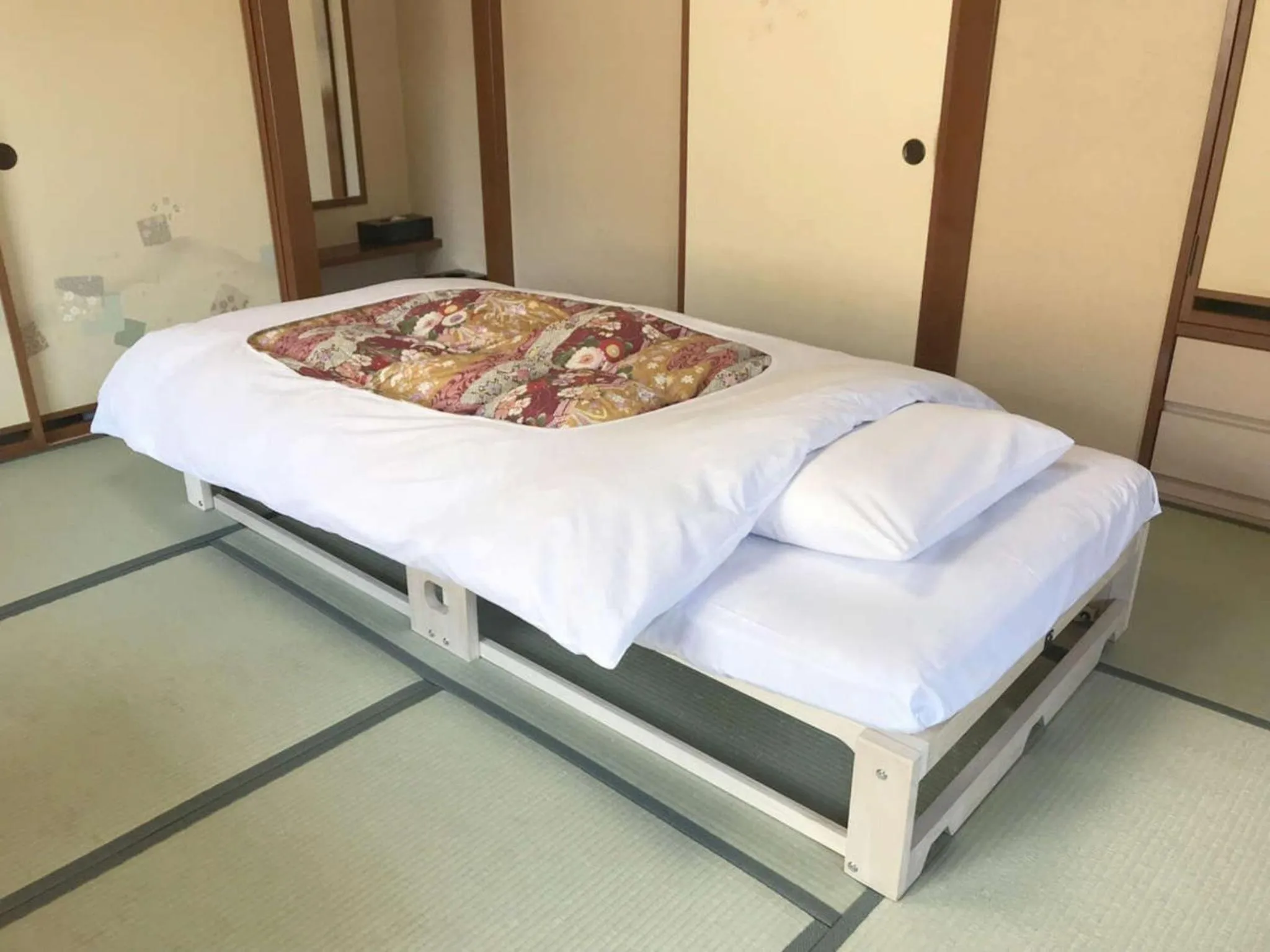 Bed in Harumiya Ryokan