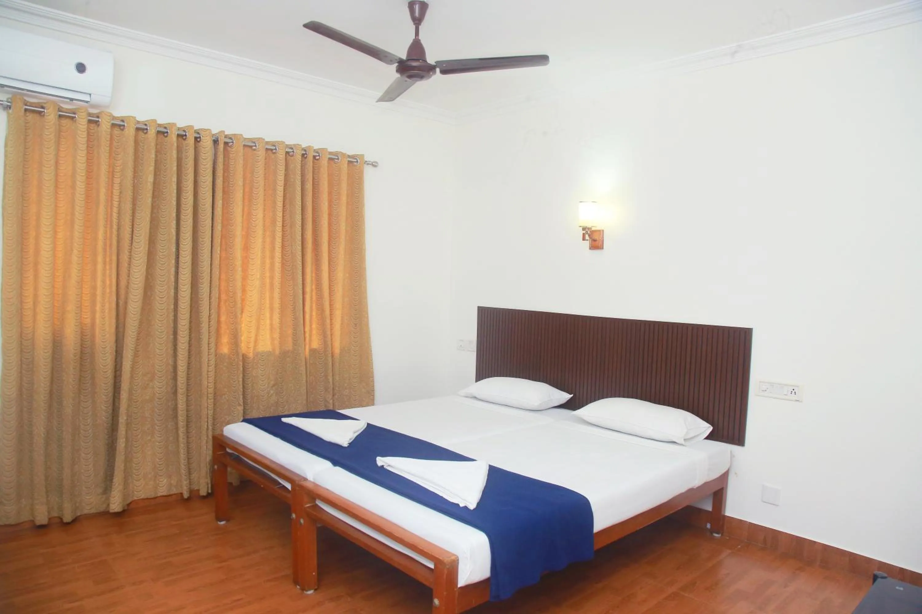 Bed in Hotel Srinivas