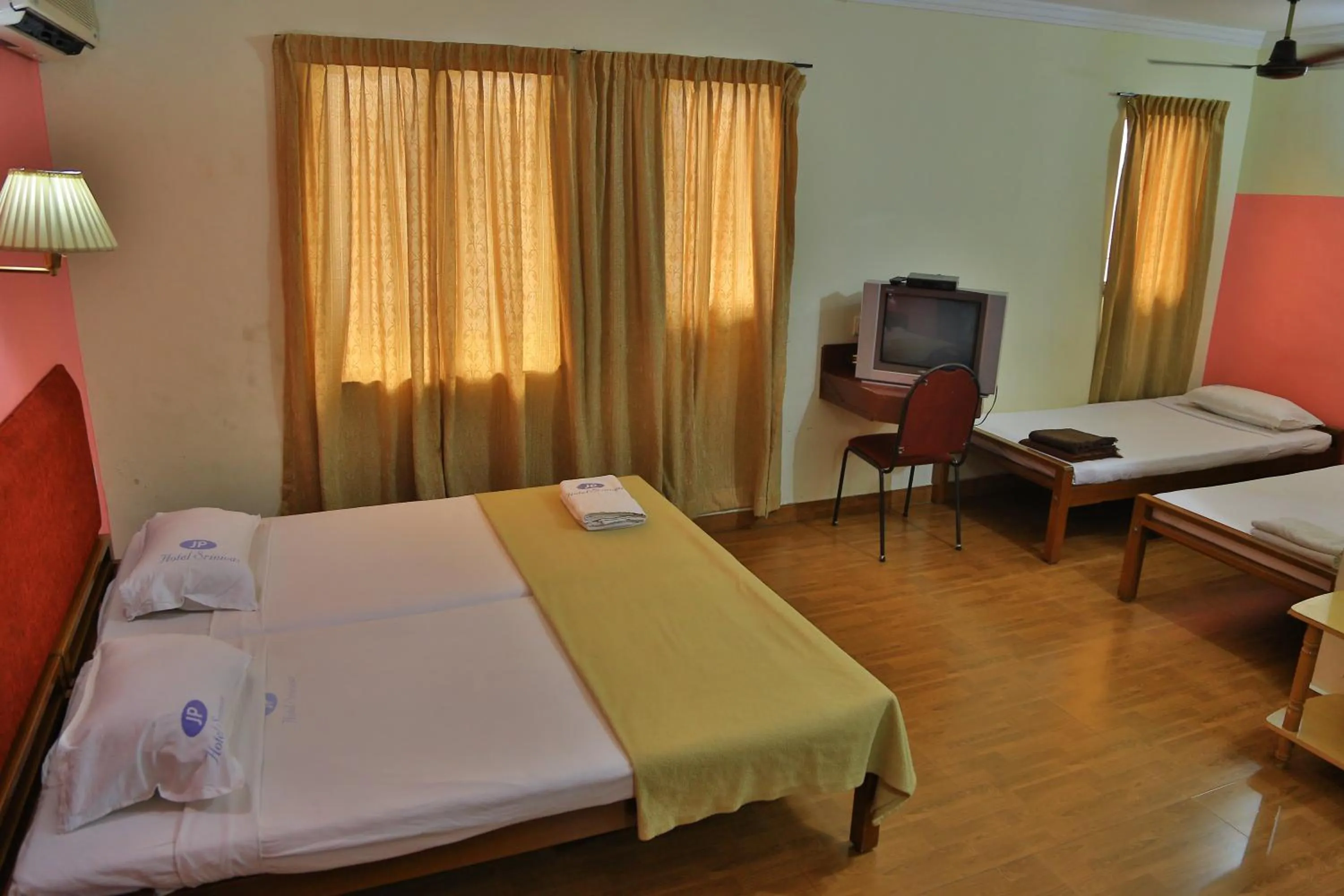 Bedroom, Bed in Hotel Srinivas