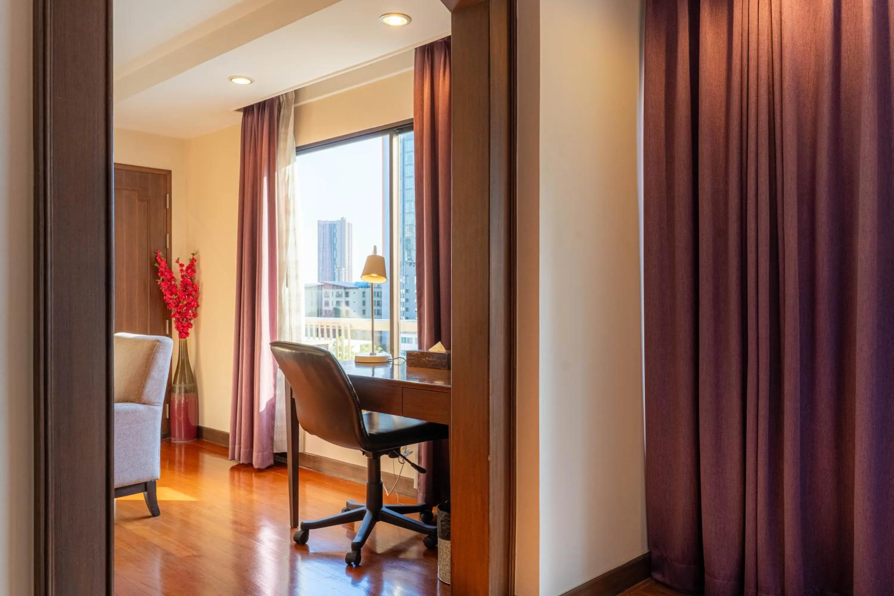 Living room in Journeyhub Sukhumvit 26, Bangkok - Formerly St James Hotel