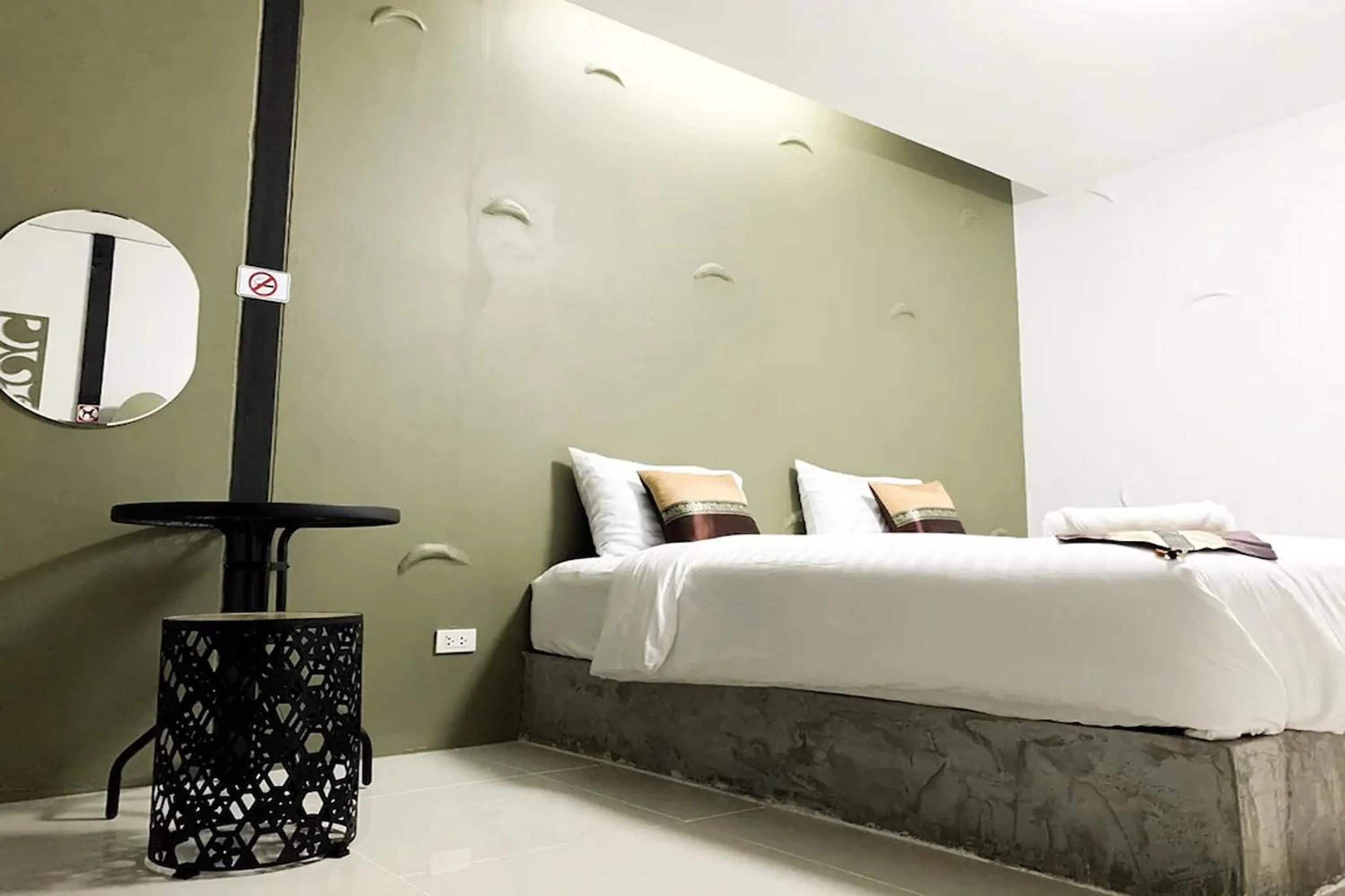 Bed in Pai Tawan Resort Hotel - Pet friendly
