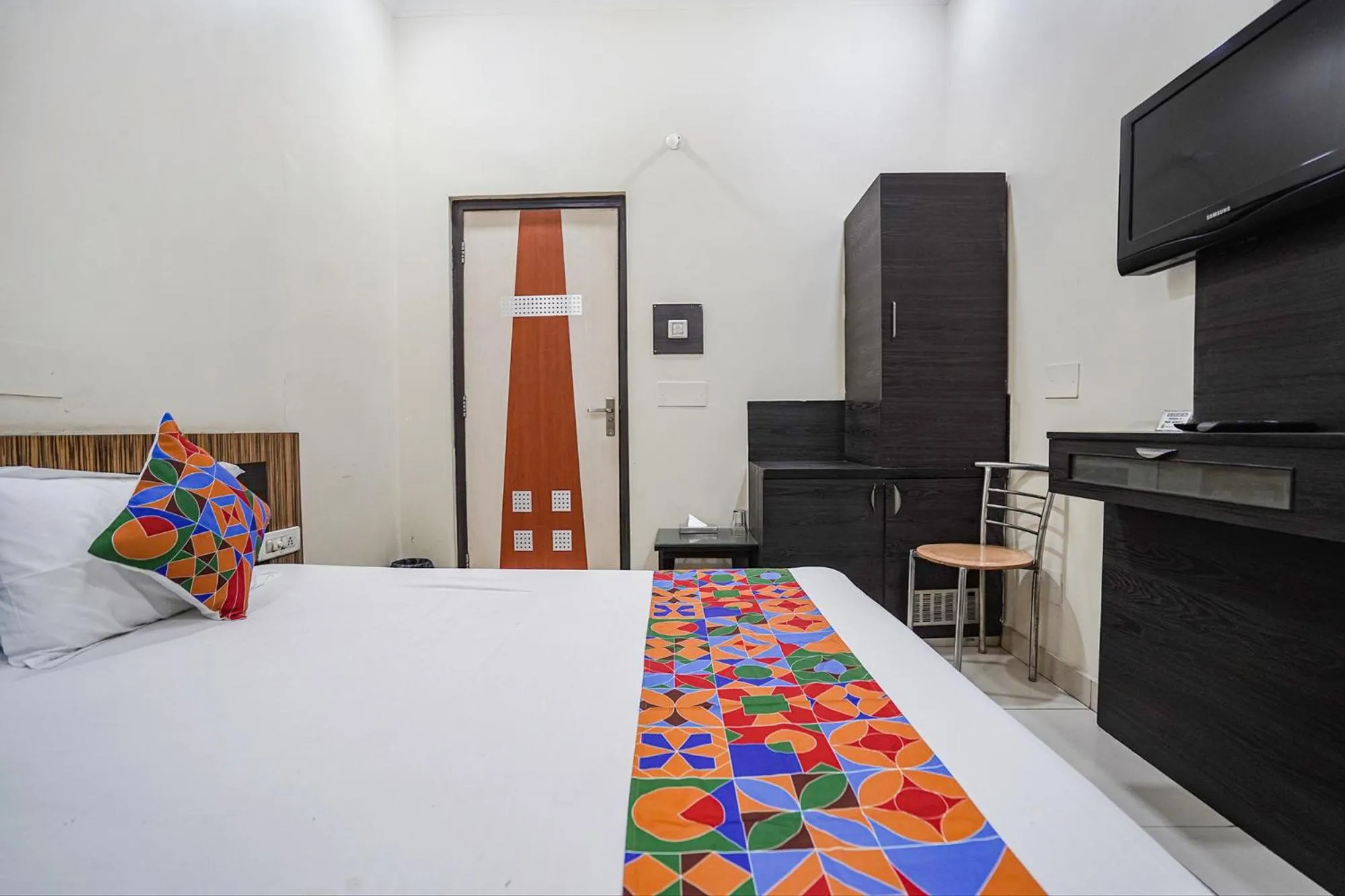 Bed in FabHotel Rivlet Premium