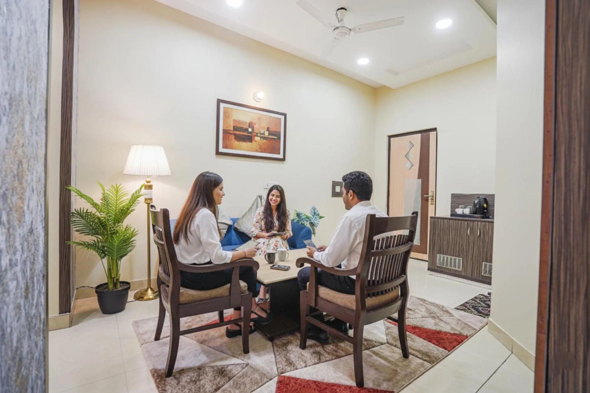 Seating area in FabHotel Rivlet Premium