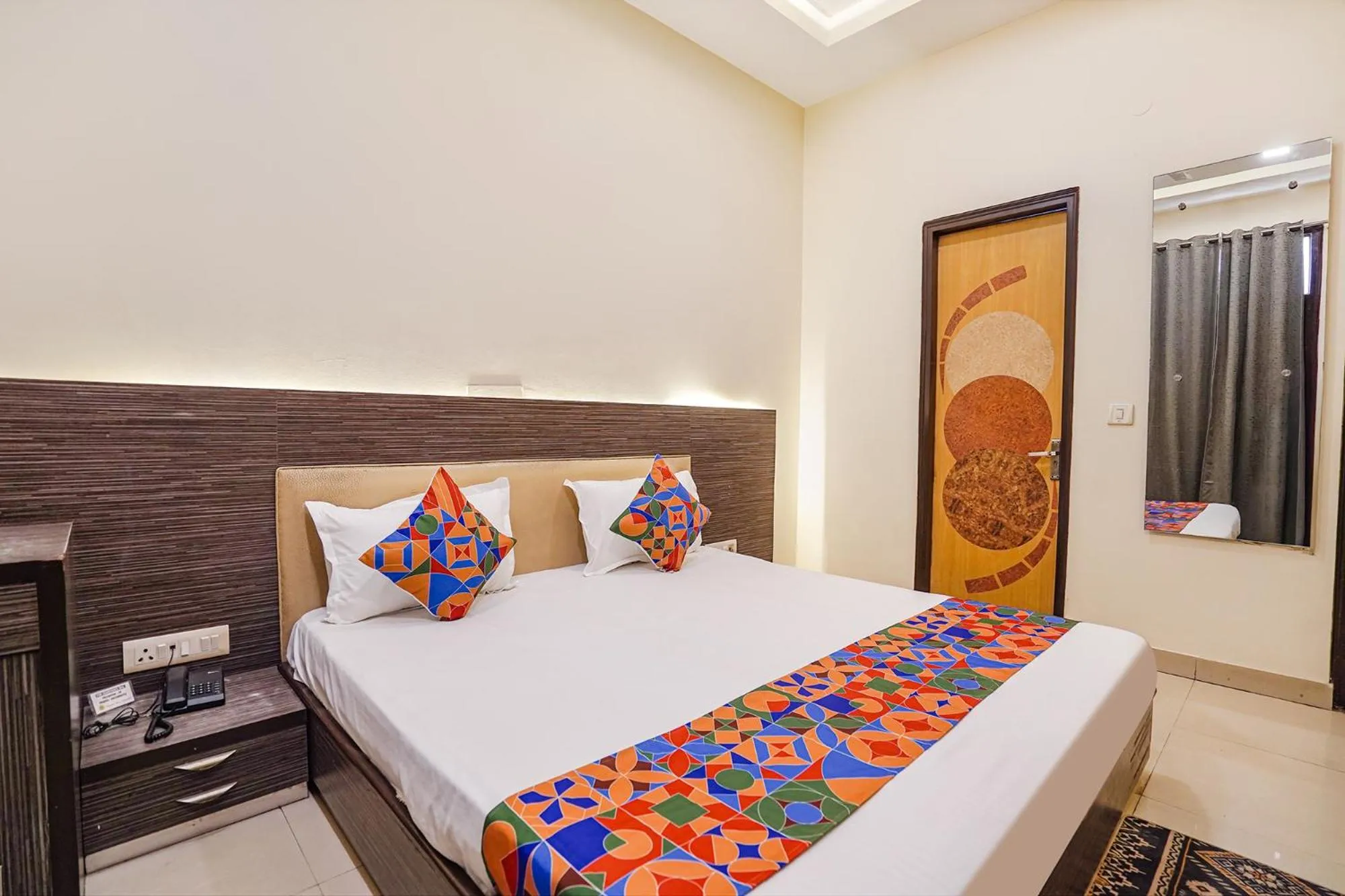 Bed in FabHotel Rivlet Premium