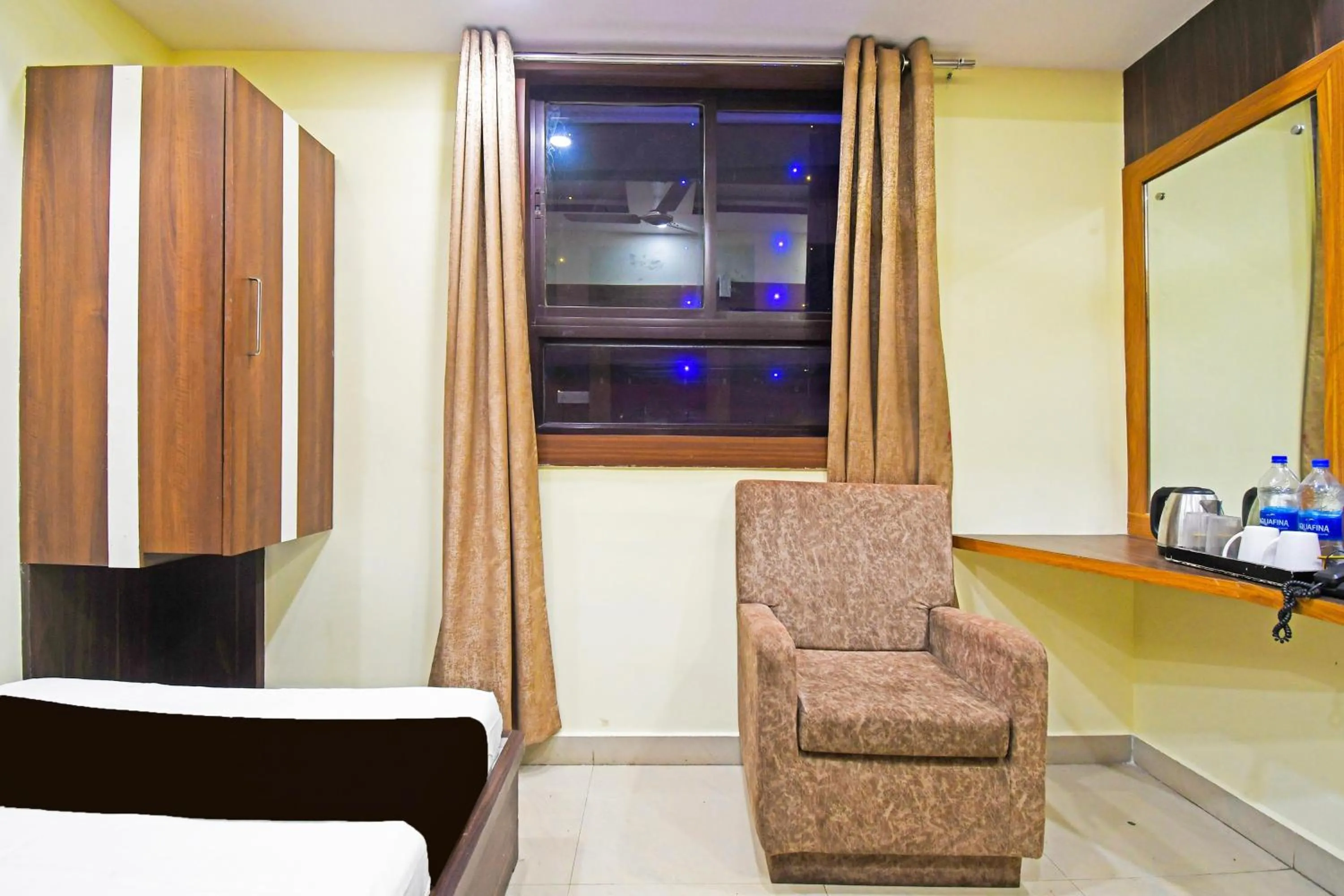 Bedroom in Hotel O Atithi Restro And Cafe
