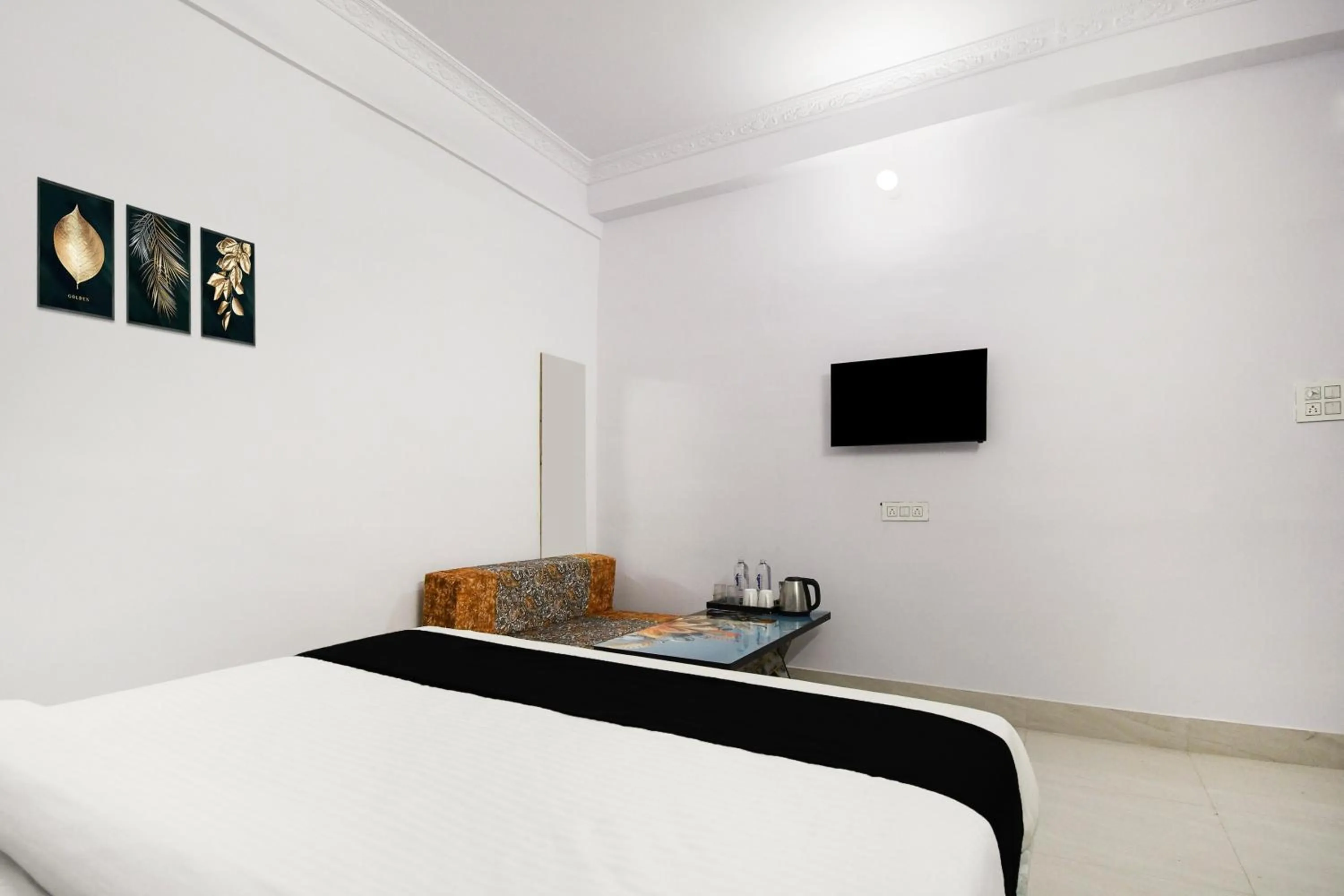 Bedroom, Bed in Super Hotel O Radha Krishna Residency