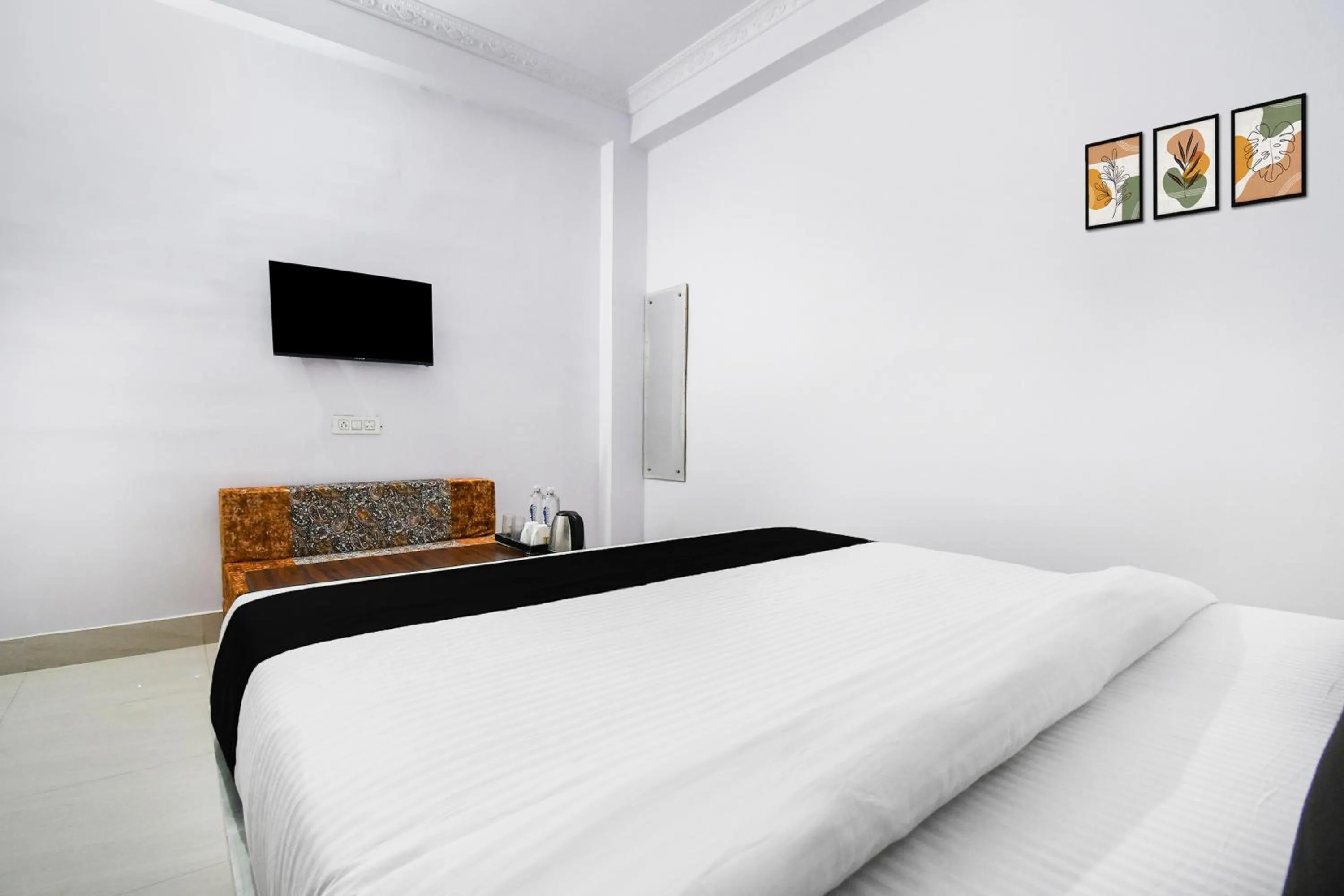 Bedroom, Bed in Super Hotel O Radha Krishna Residency
