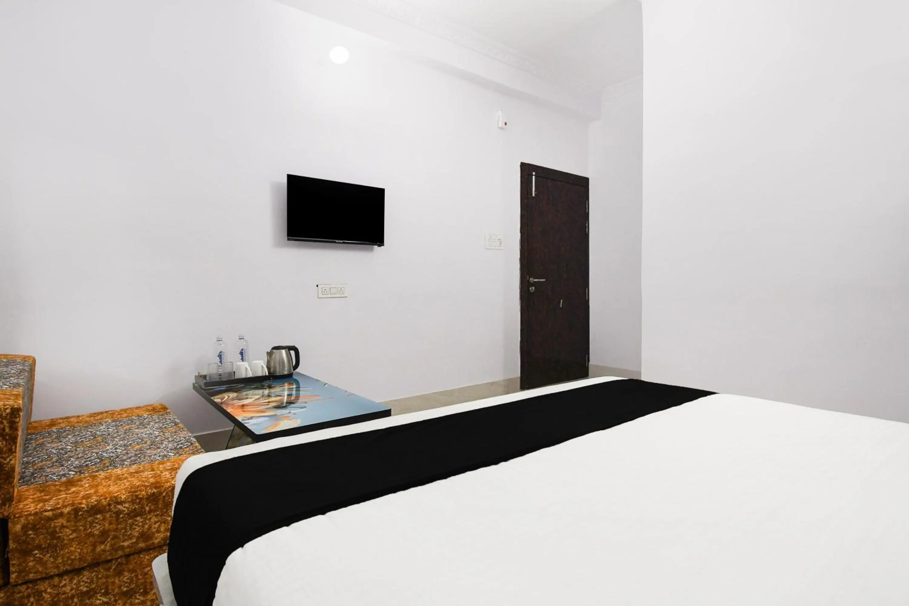Bedroom, Bed in Super Hotel O Radha Krishna Residency