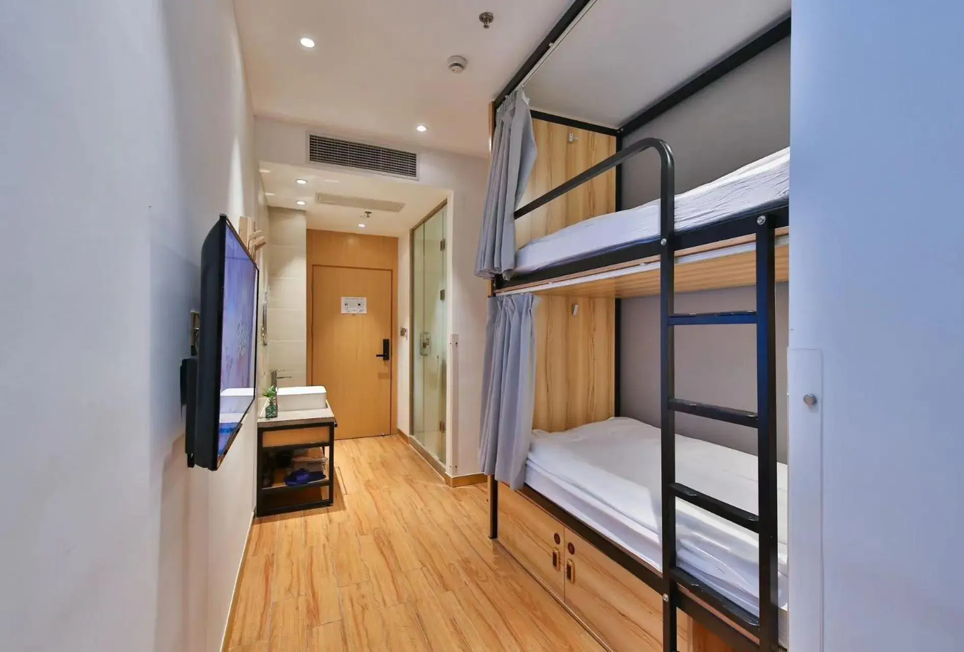 Bed in 2 -Bed Dormitory Room - Shared Bathroom in Shanghai Pengpai Art Youth Hotel Bed in 2 -Bed Dormitory Room - Shared Bathroom in Shanghai Pengpai Art Youth Hotel