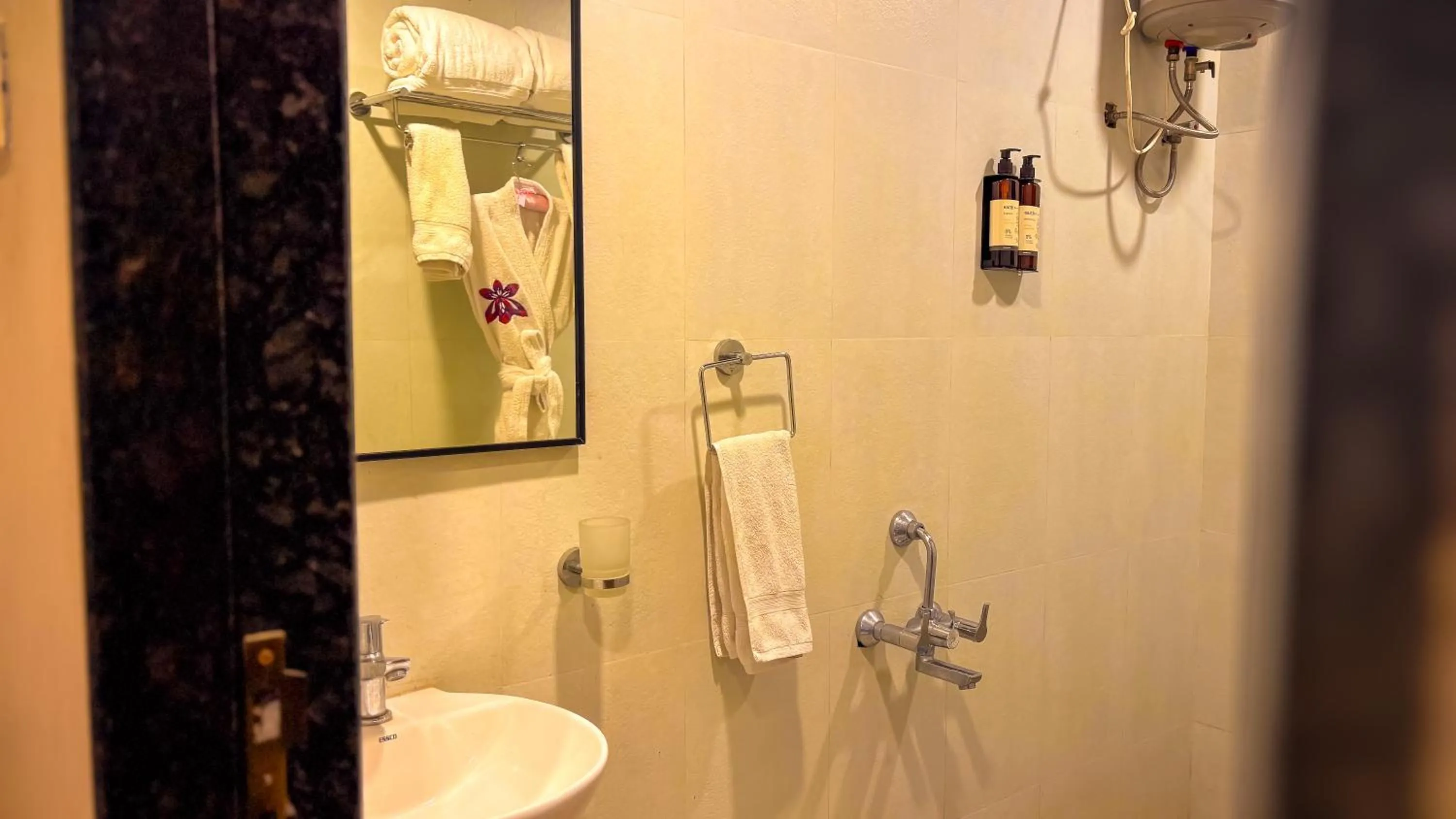 Bathroom in Regenta Bharti Amusement & Adventure Resort Pune, Urulikanchan