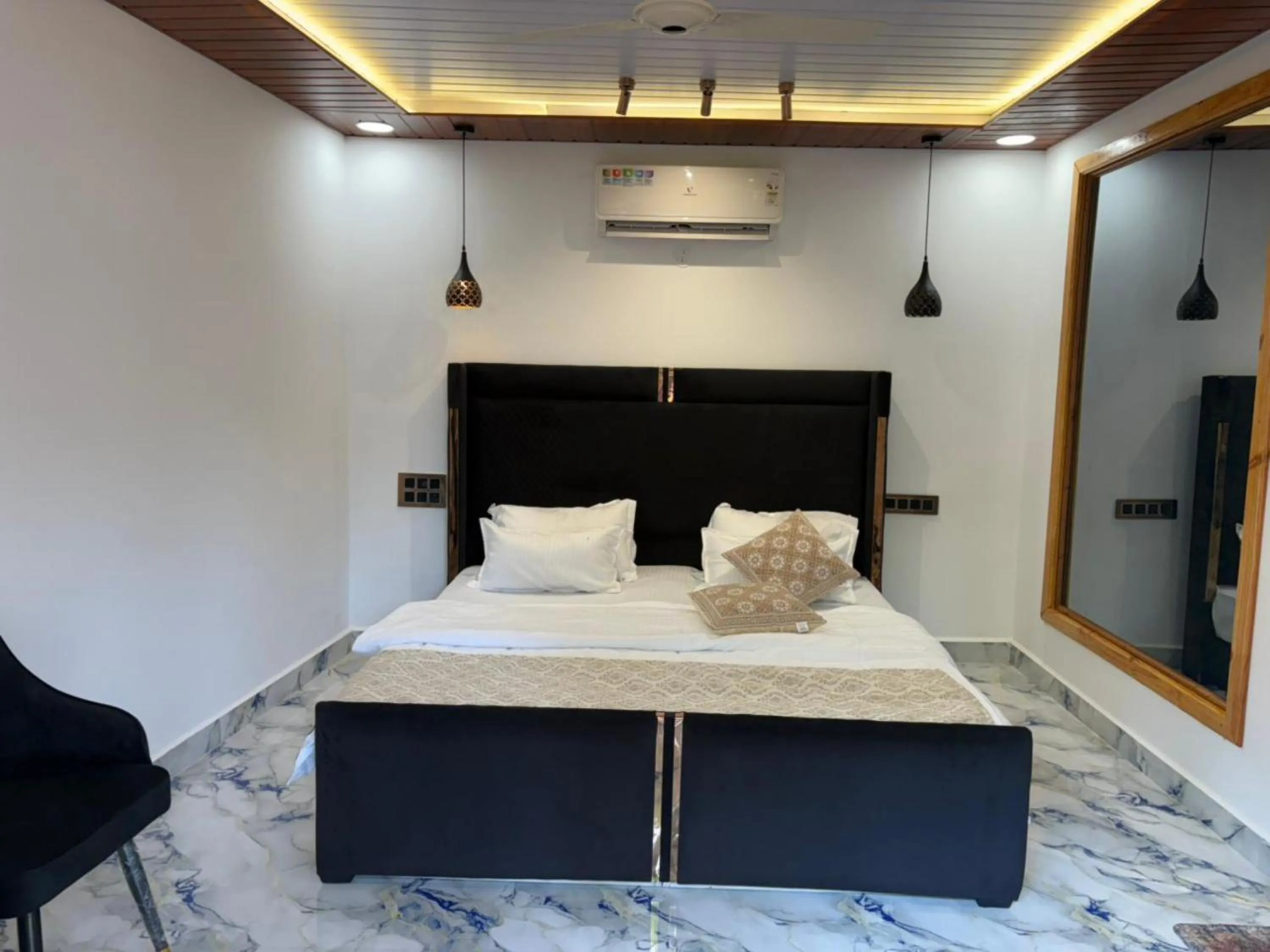 Photo of the whole room, Bed in The Charming Nights