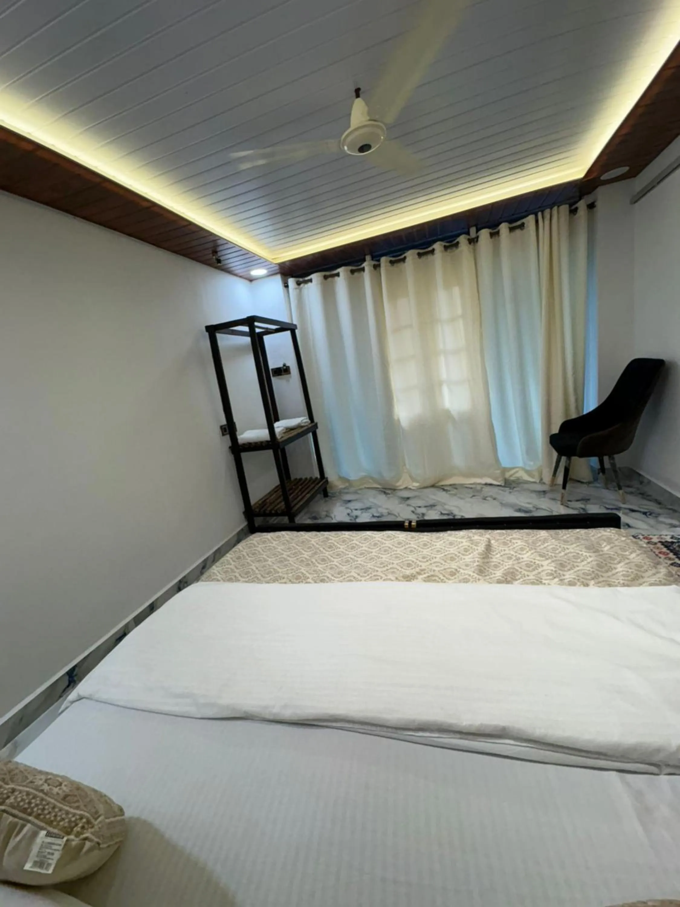 Photo of the whole room, Bed in The Charming Nights