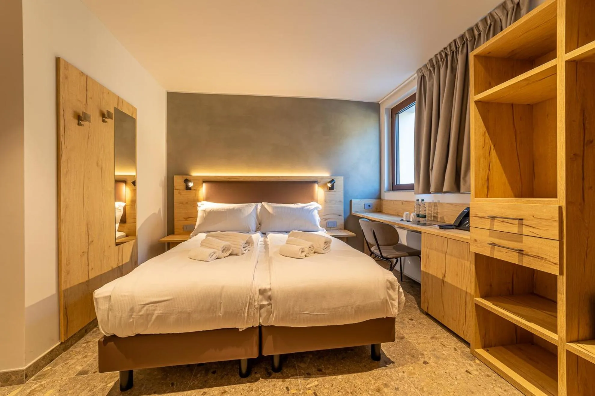 Bedroom, Bed in Riserva Bianca Limone Hotel & SPA