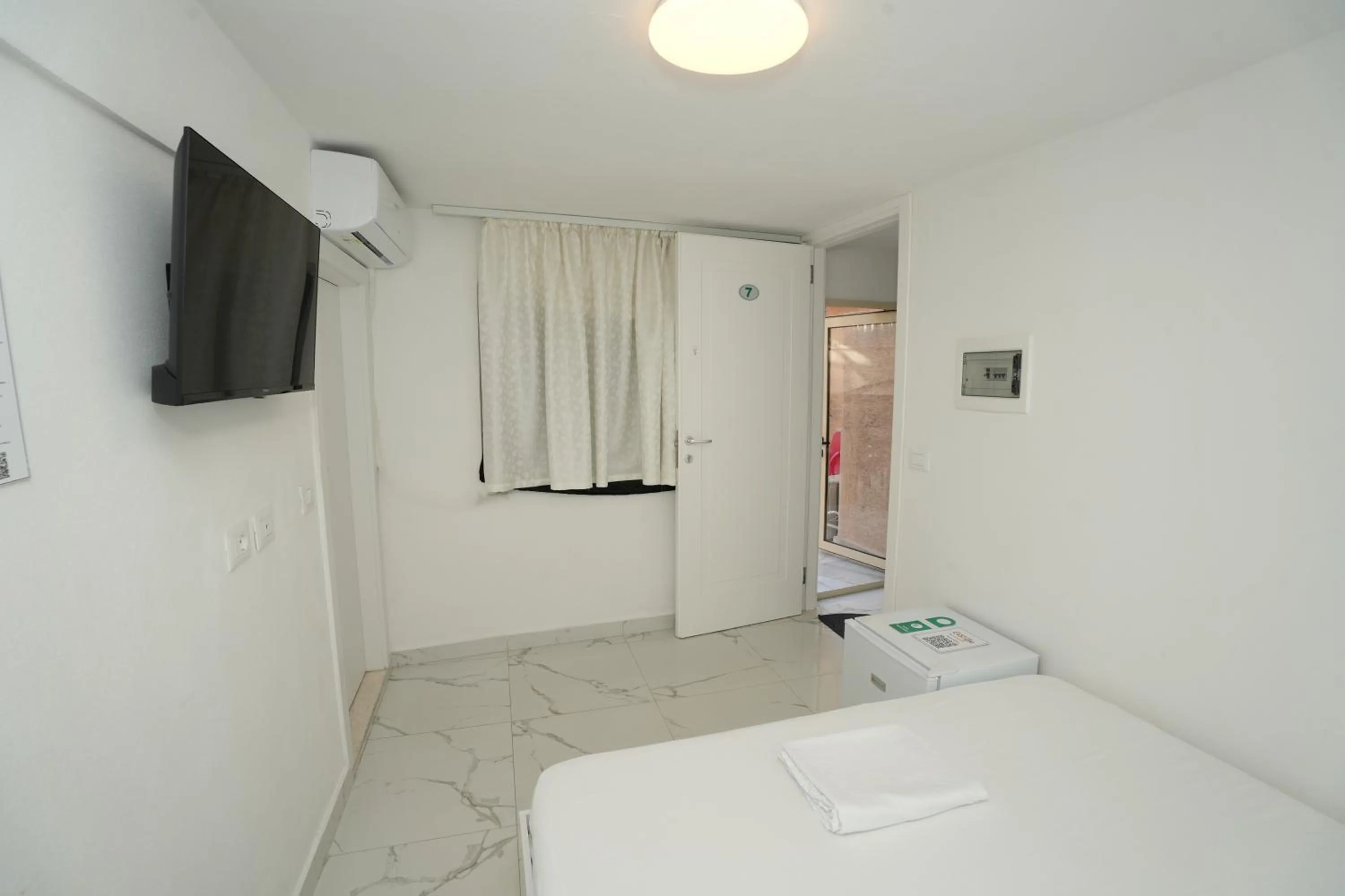 Bedroom in Enles Hotel