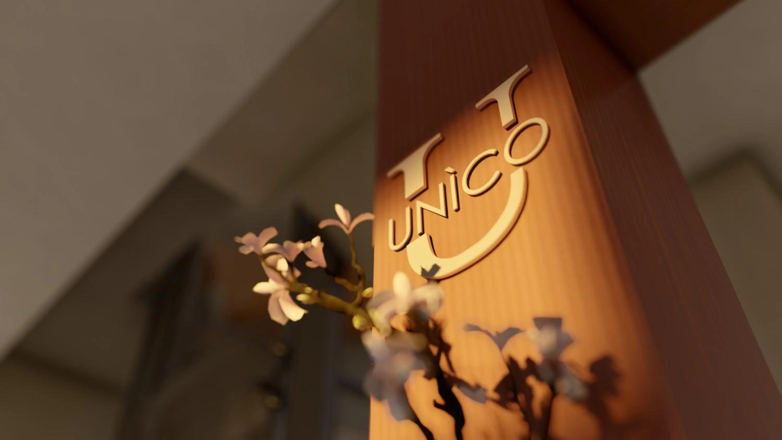 Property logo or sign in Hotel Unico by Dori