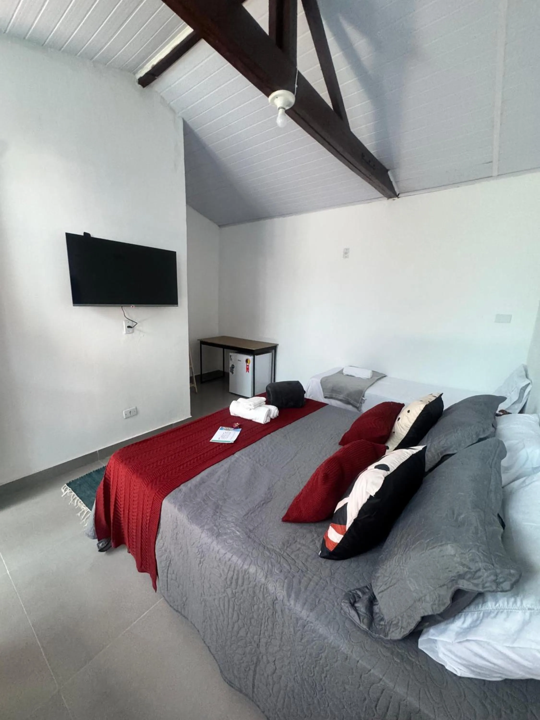 Bed in POUSO DE ICARO - POUSADA NO CENTRO de PARATY