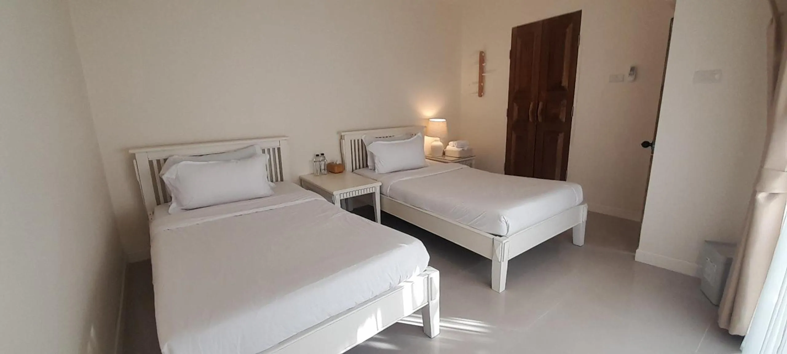 Bed in To The Moon Guesthouse