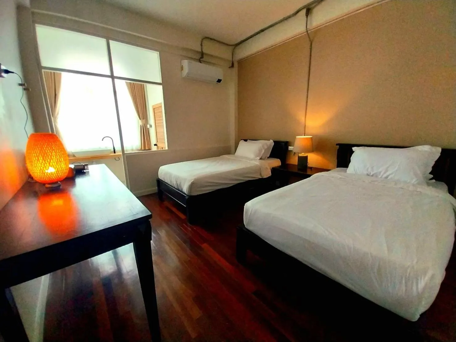 Bed in To The Moon Guesthouse