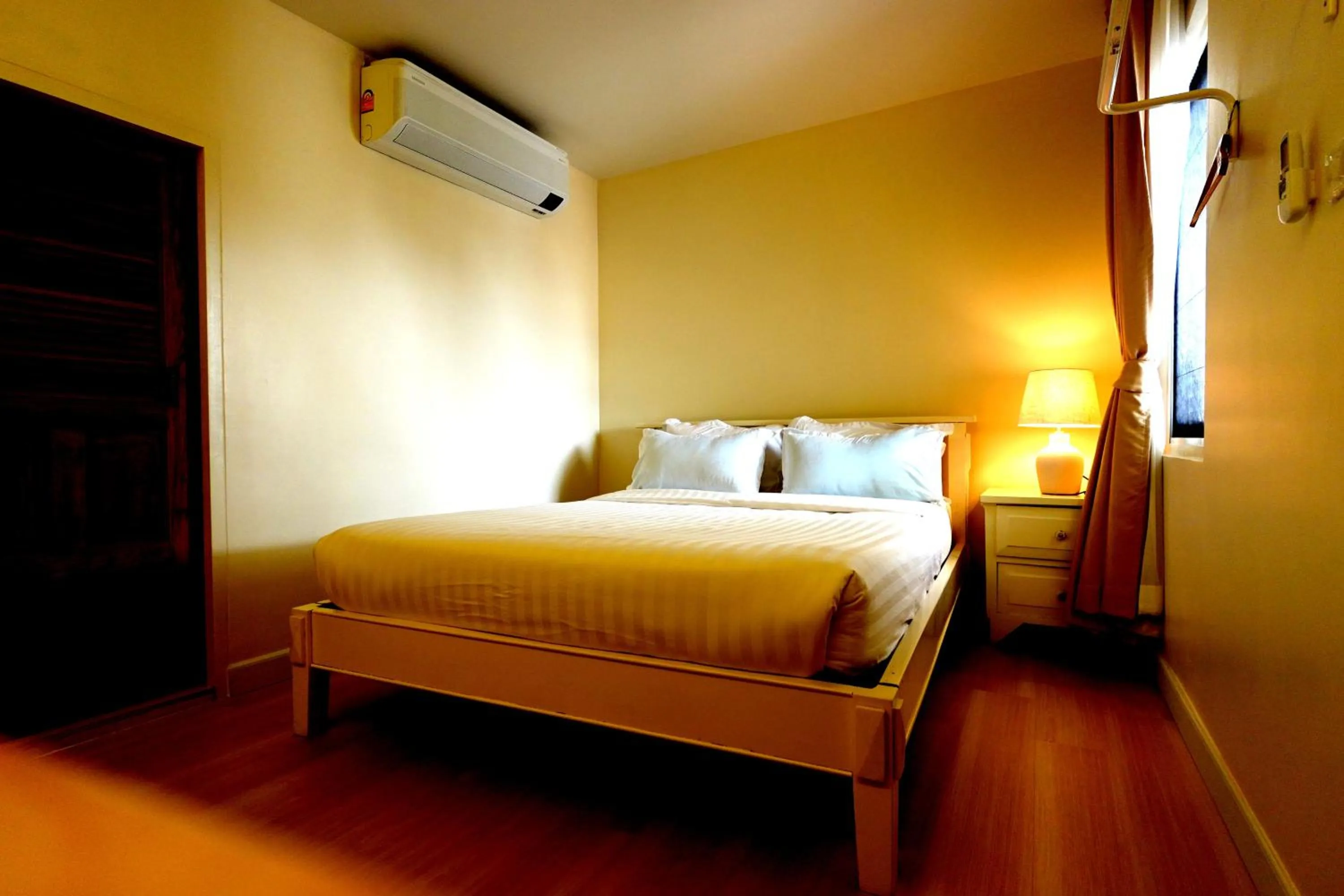 Bed in To The Moon Guesthouse