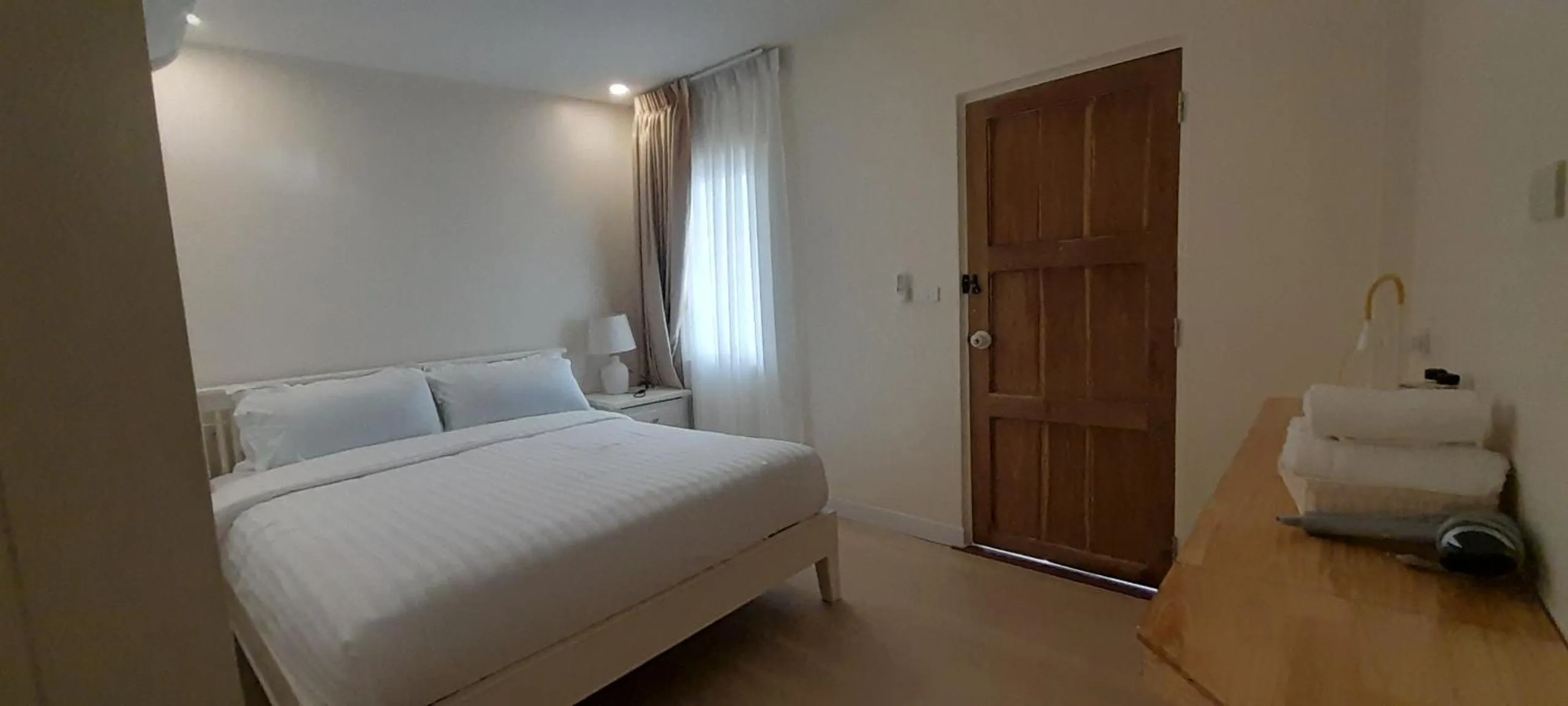 Bed in To The Moon Guesthouse