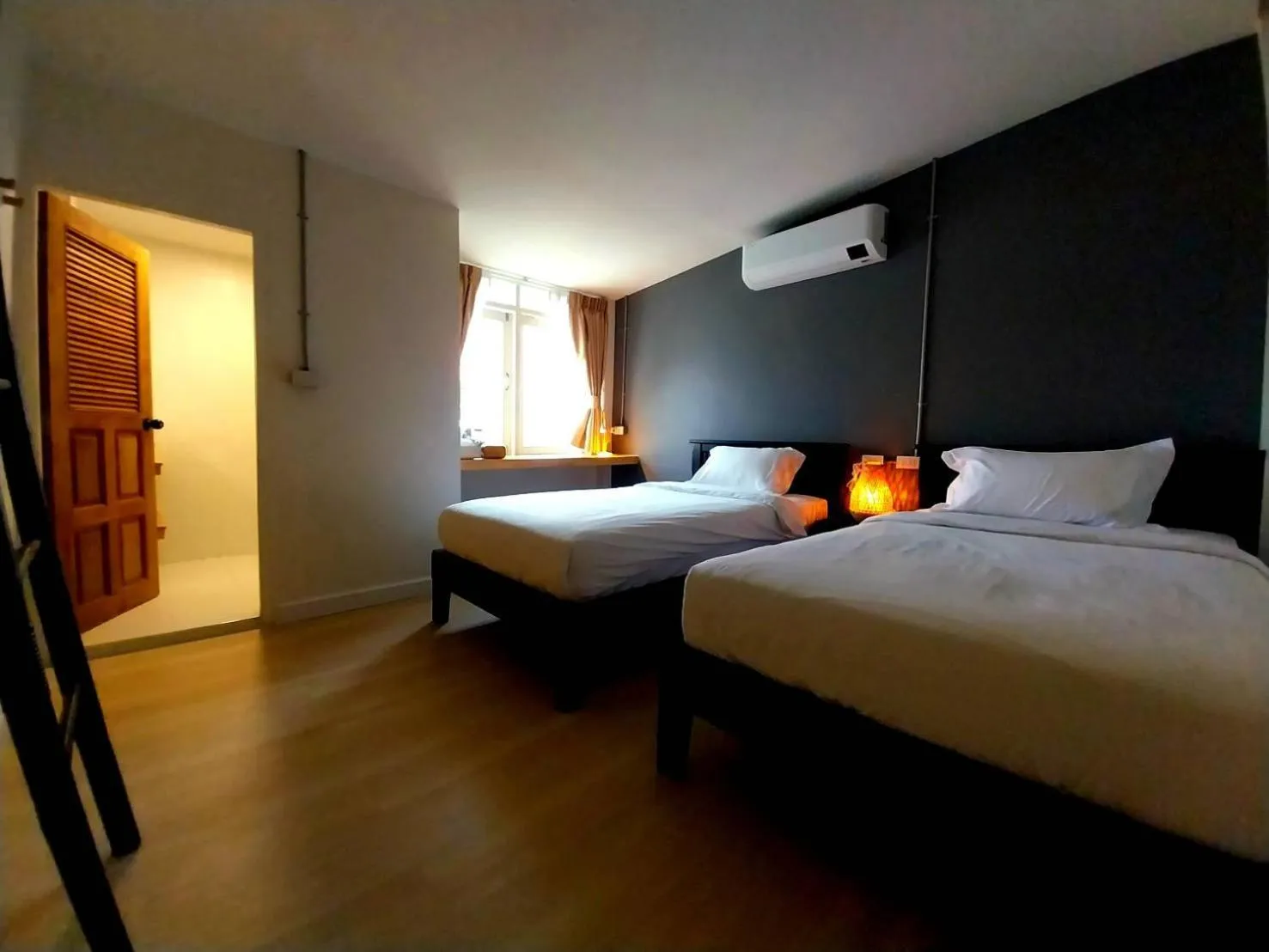 Bed in To The Moon Guesthouse