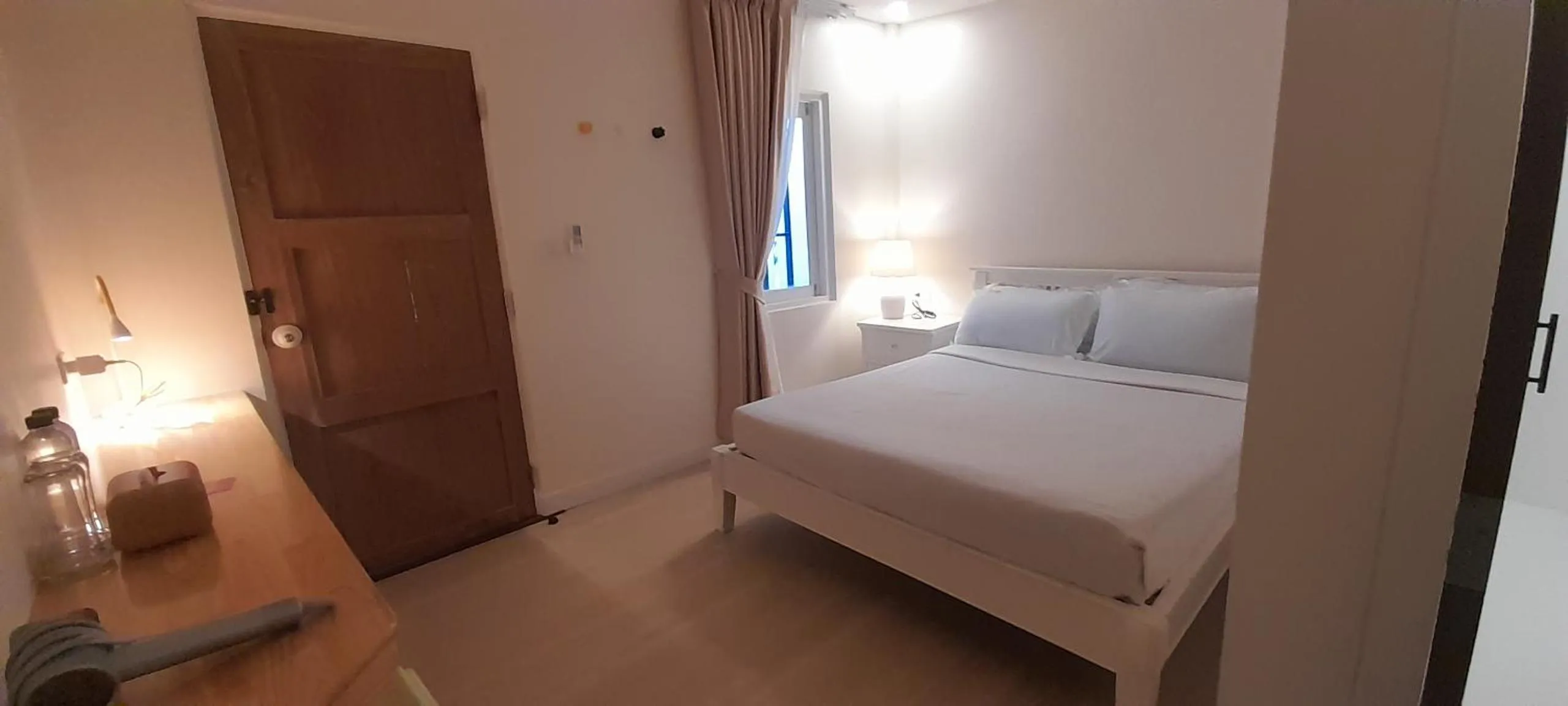 Bed in To The Moon Guesthouse