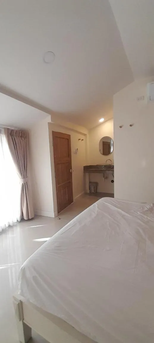 Bed in To The Moon Guesthouse