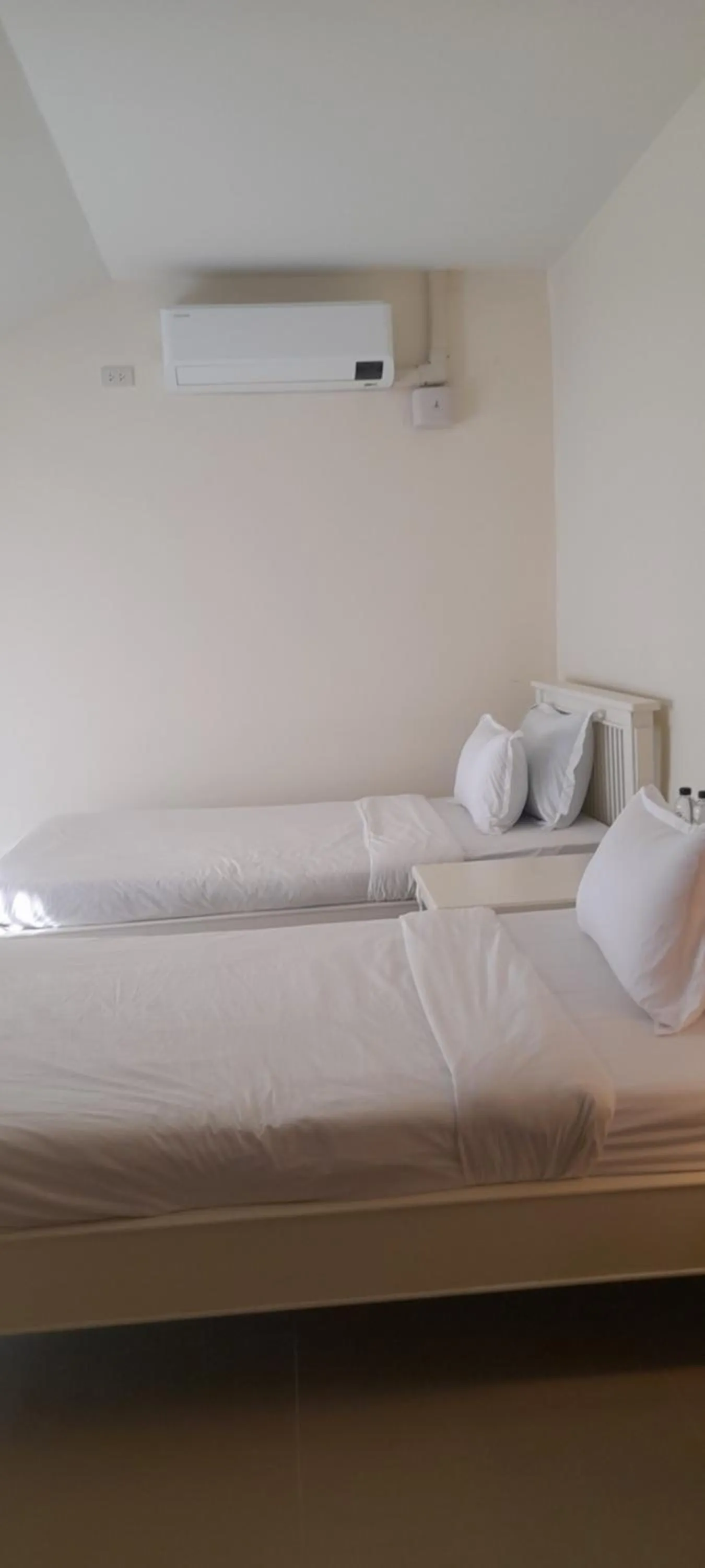 Bed in To The Moon Guesthouse