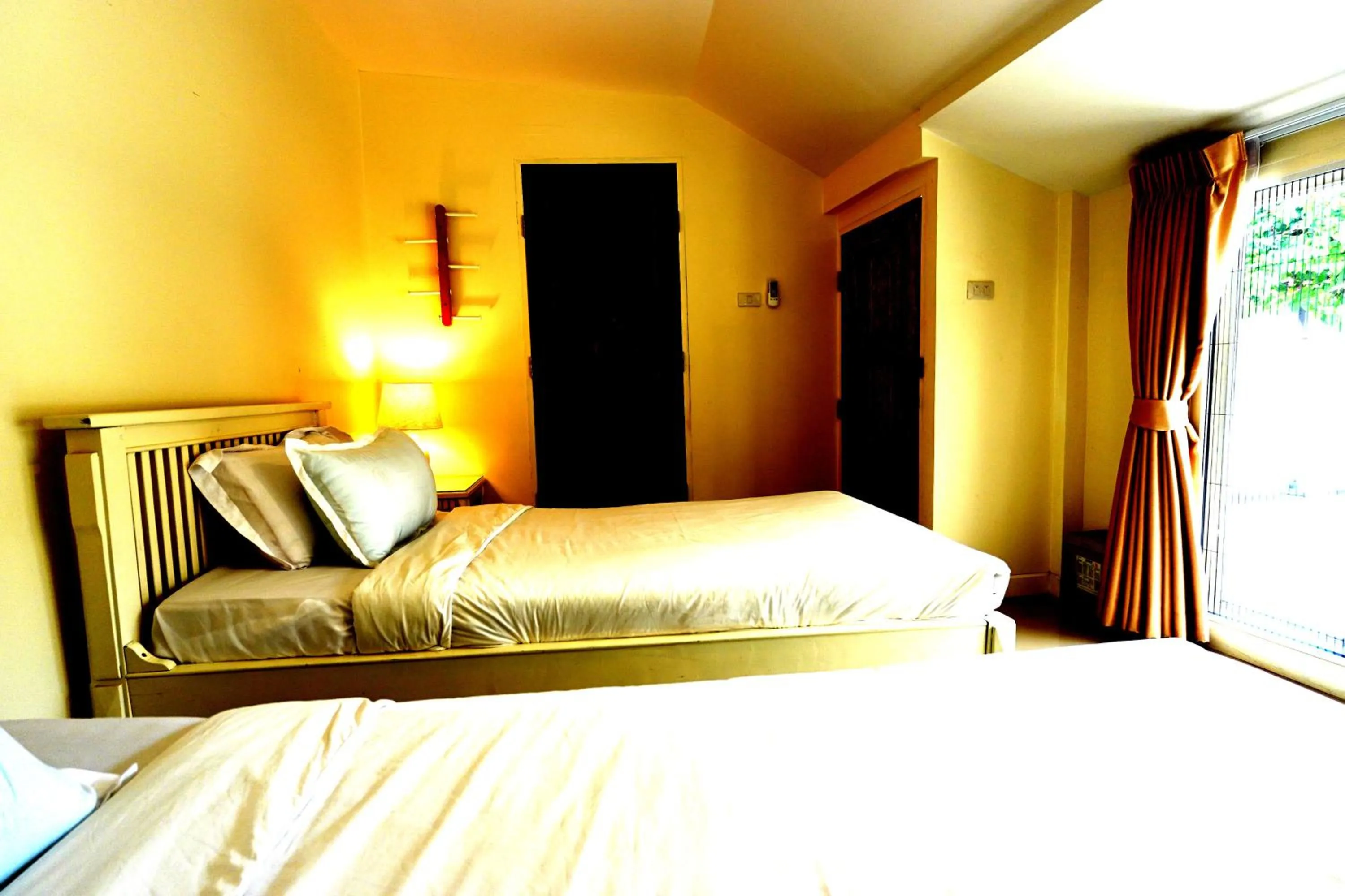 Bed in To The Moon Guesthouse