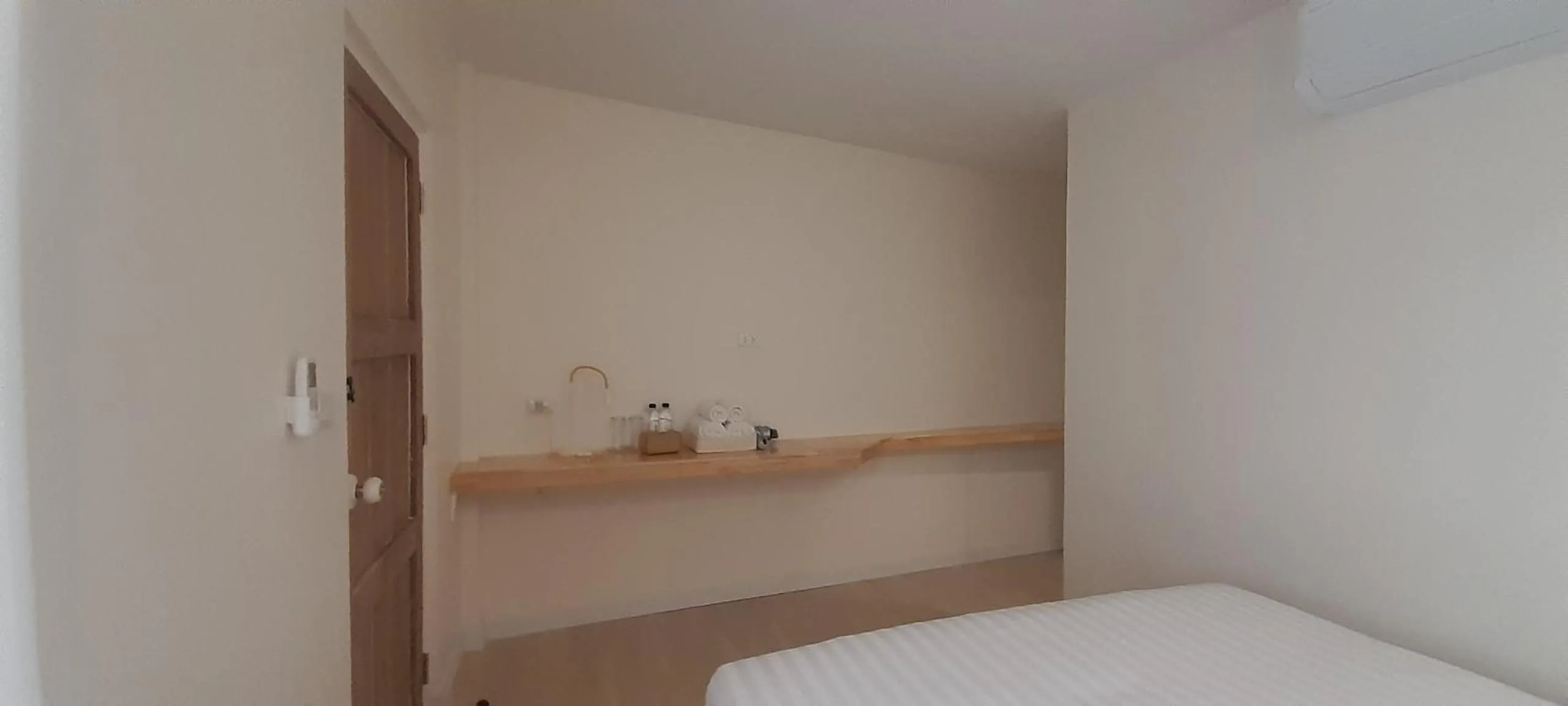 Bed in To The Moon Guesthouse