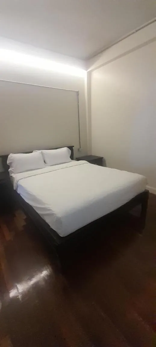 Bed in To The Moon Guesthouse