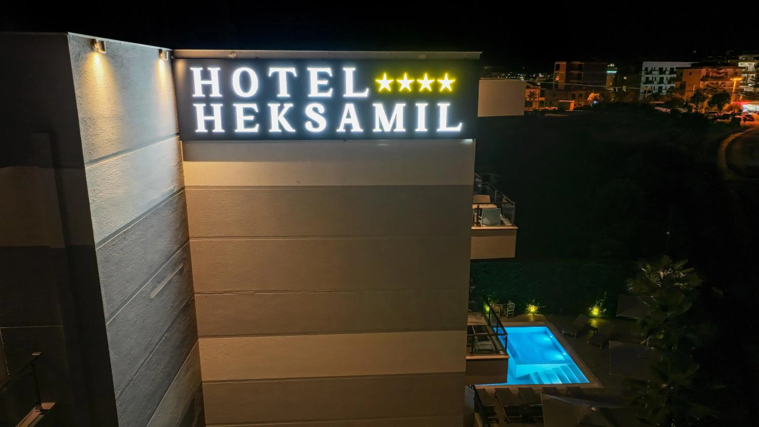 Property logo or sign in Heksamil Hotel