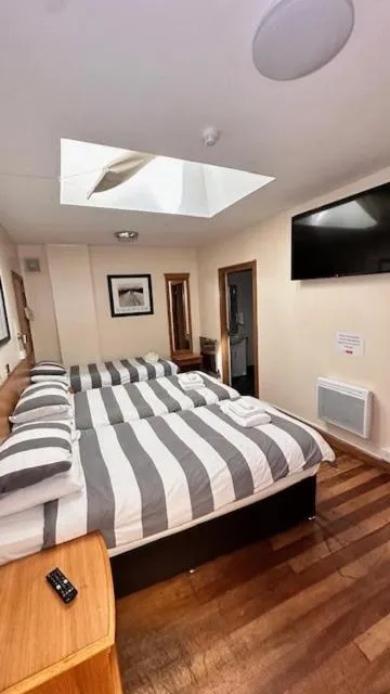 Bed in Shanahans B&B with Sports Bar