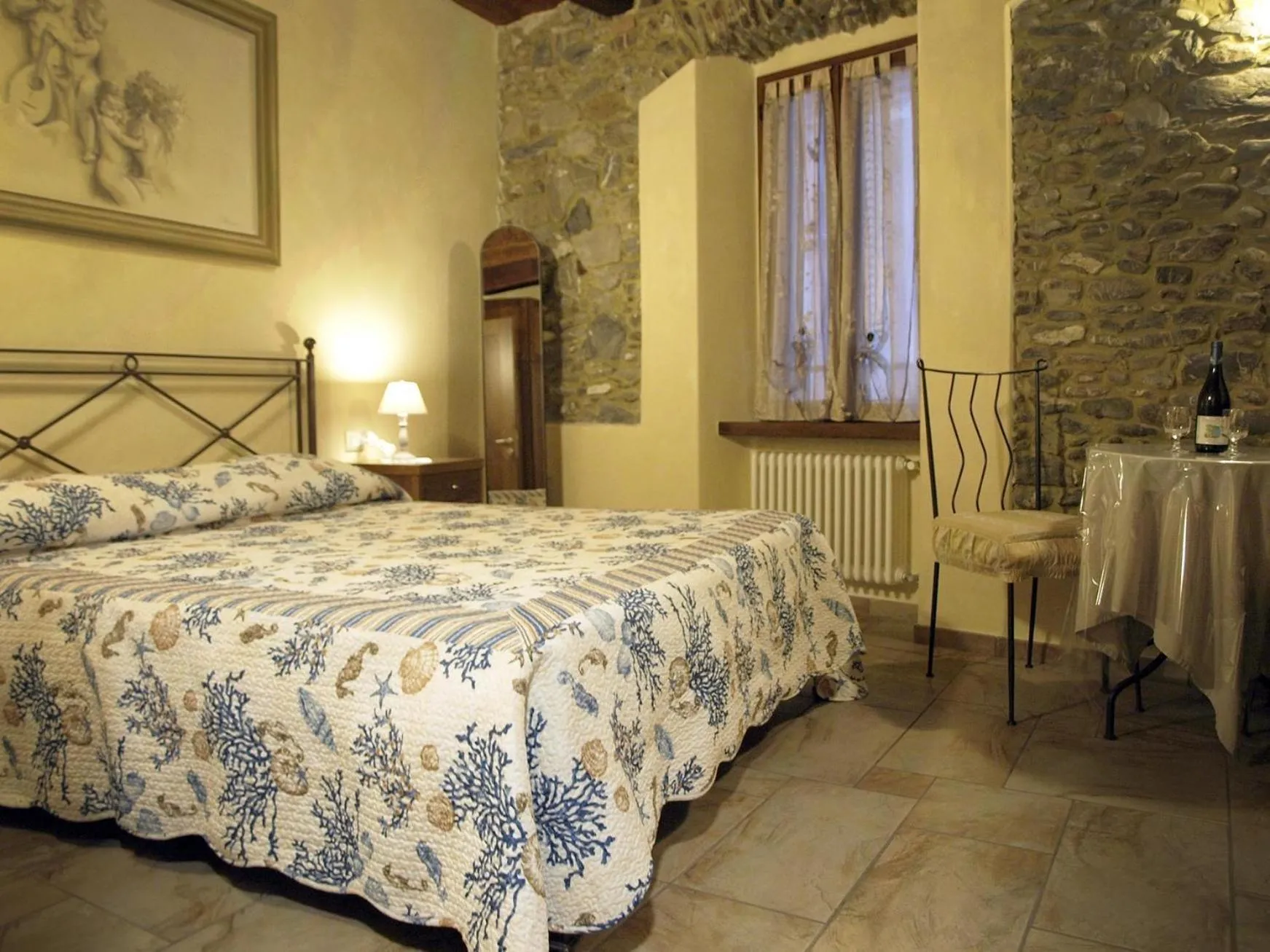 Photo of the whole room, Bed in Pietre di Mare