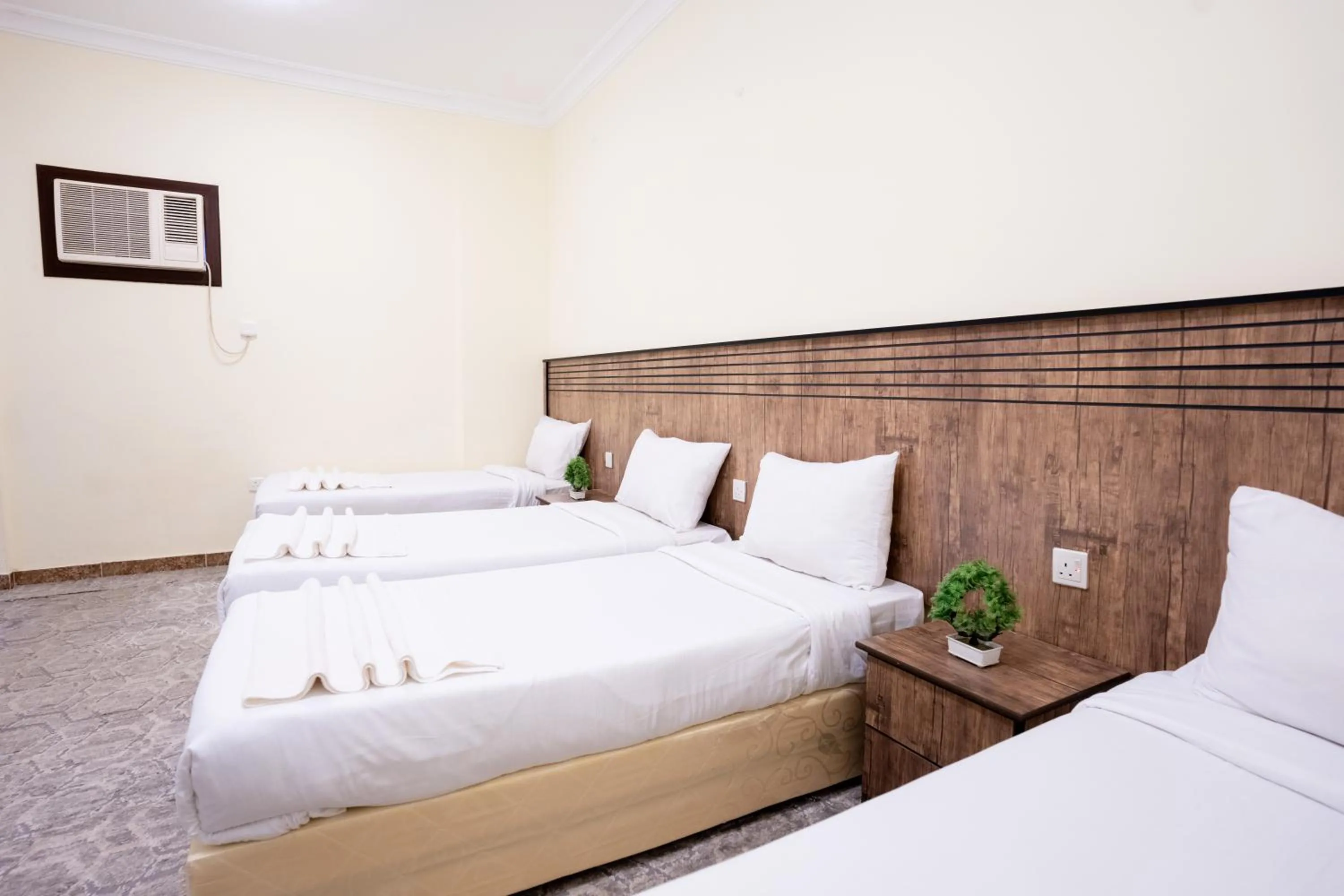 Quadruple Room with Private Bathroom in Saif Plus 3 Hotel by Orvana