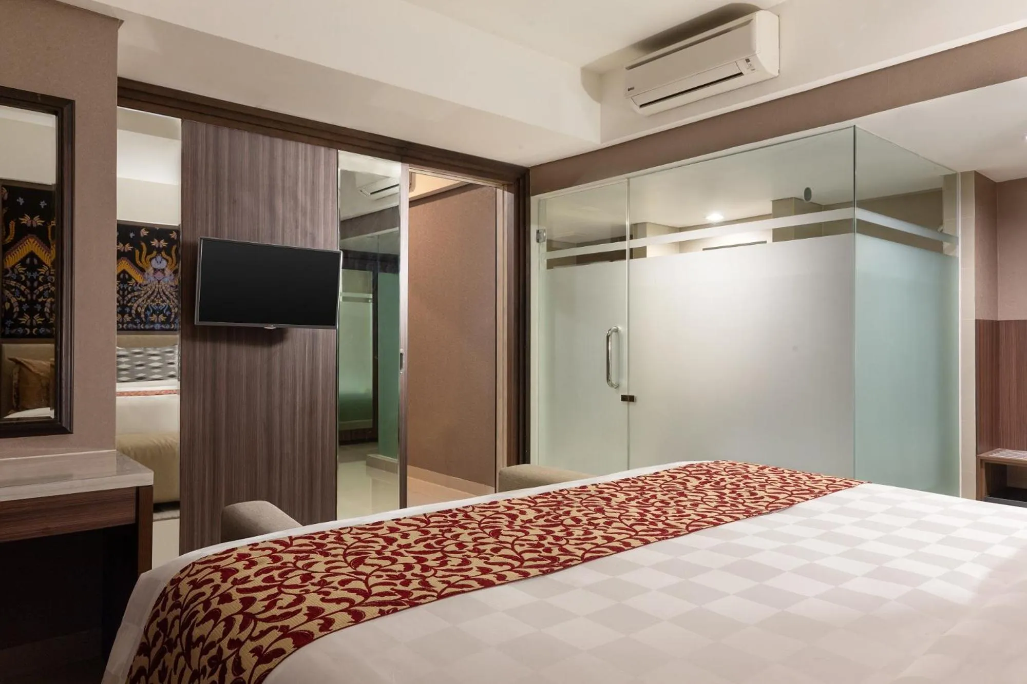 Bed in The Alana Hotel & Conference Center Malioboro Yogyakarta by ASTON
