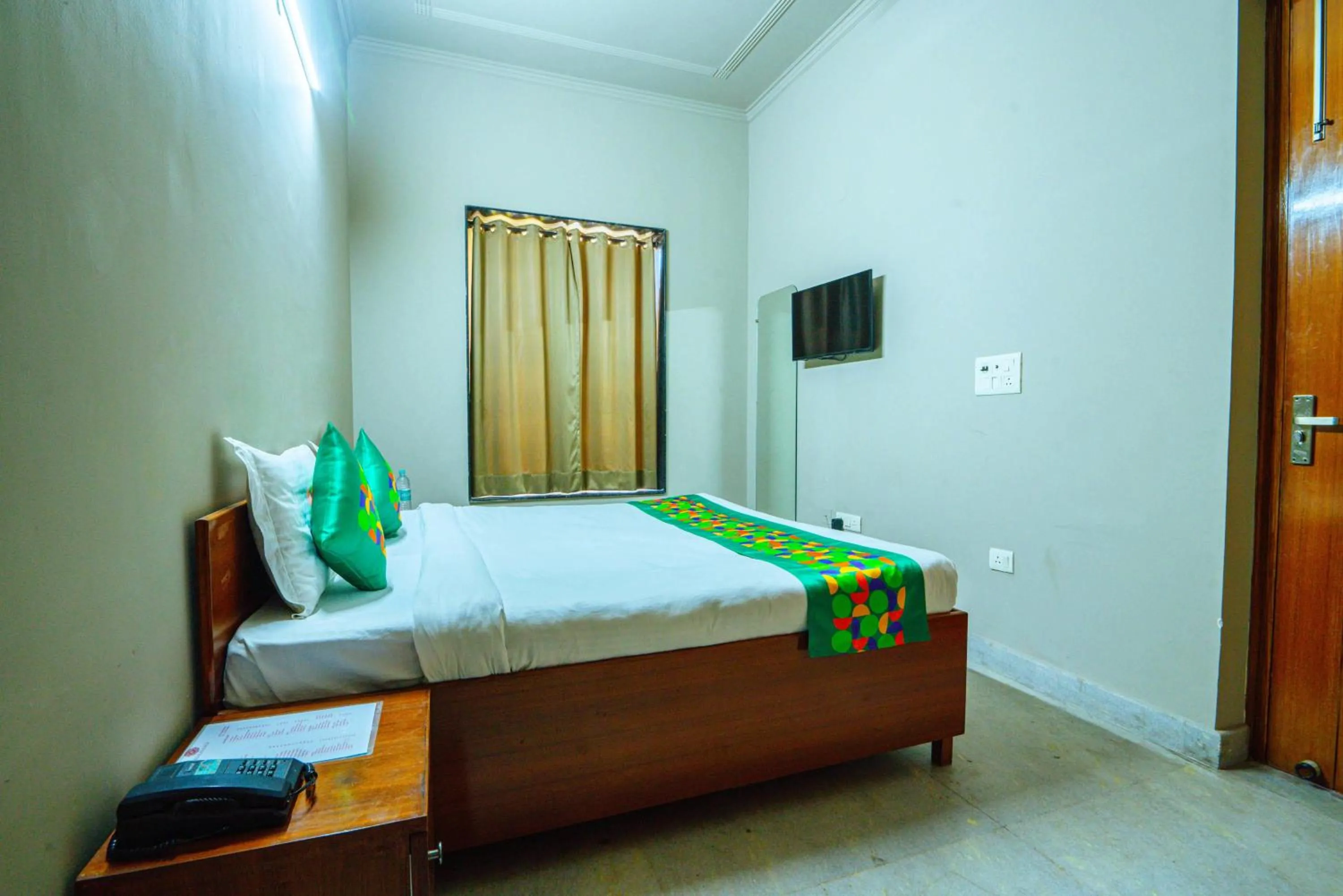 Bedroom, Bed in Treebo Royal City