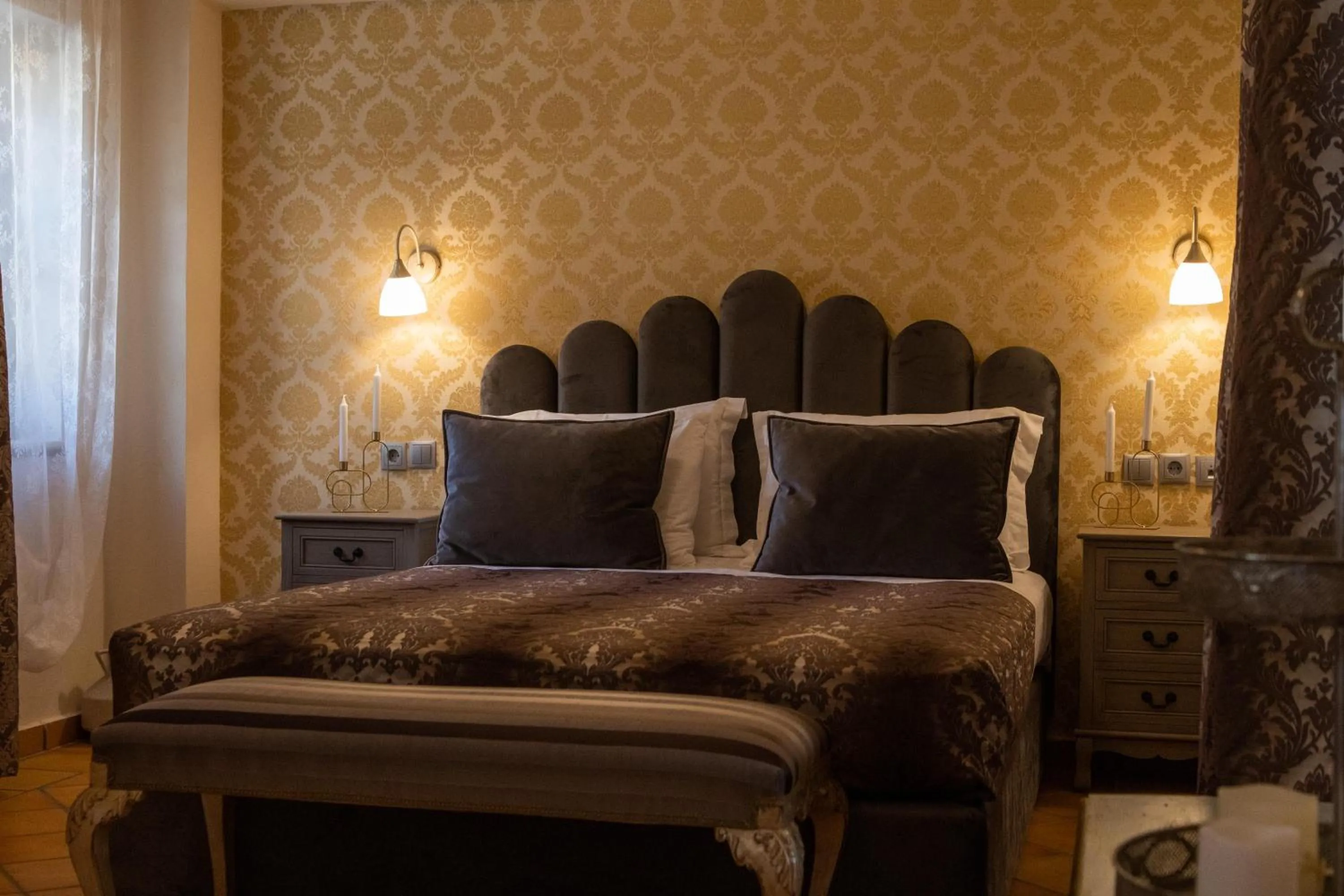 Bed in April Medieval Hotel